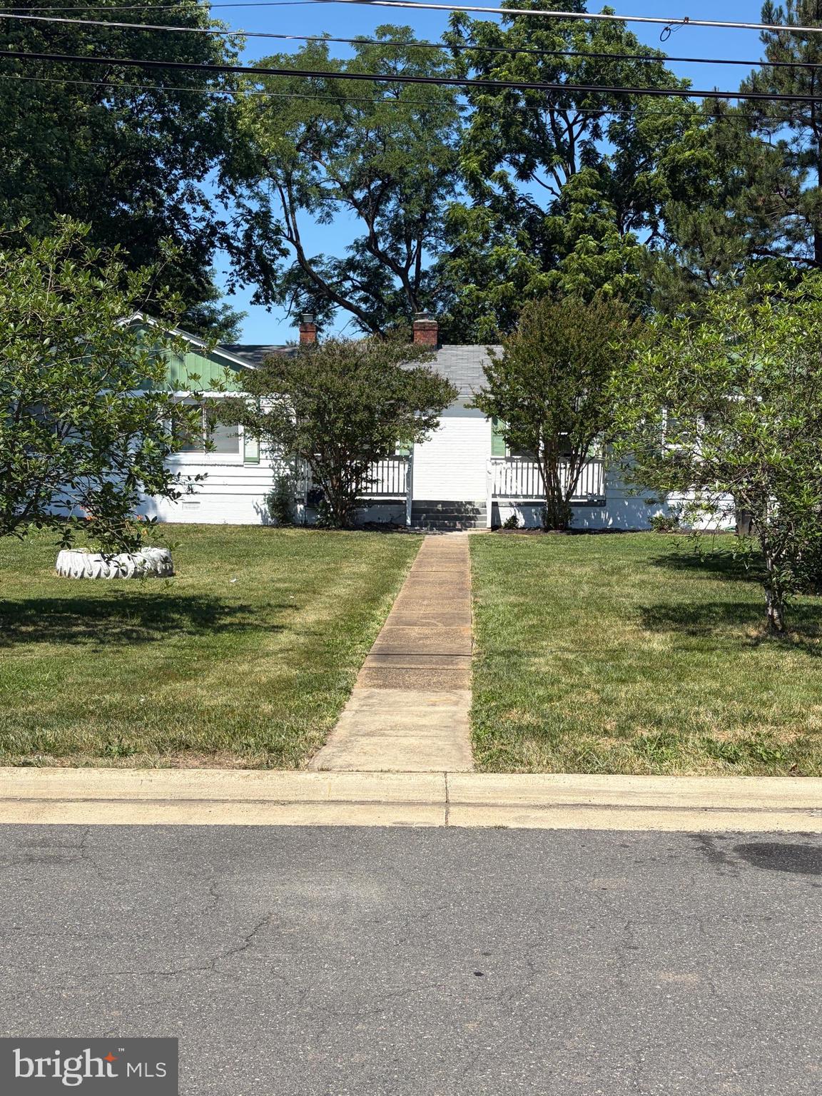 This is a rare and hard to find 3 bedroom, 1 bath duplex.  It is on the left side of the front walkway. The inside has just been renovated. It has new laminate flooring, new carpeting, new remodeled kitchen with new cabinets, stainless steel refrigerator, dishwasher, stove, microwave, sink, countertops,  bathroom vanity, tub, toilet, lighting, freshly painted, approximately 2 year old roof, brick fireplace in the family room, large fenced backyard, large storage shed. Close to downtown Leesburg. 109 Washington St, next door on the right side of the walkway, is also new on the market.