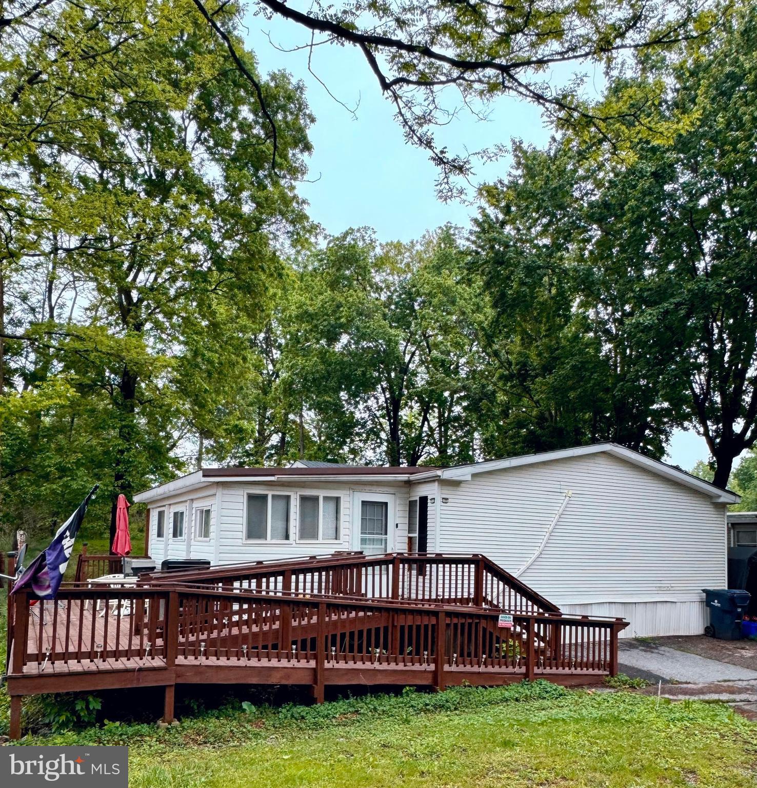 A great layout and thoughtful updates make this mobile home a must-see. The updated kitchen flows into the dining area and living room, creating a spacious main area with an open feel. The bedrooms offer ample space, and two full bathrooms make this mobile home a rare find. Standout features are the enclosed porch and large deck, offering ideal spots for entertaining, hobbies, or having you own private place to relax. 

The mini-split system provides efficient heating and cooling, and both the system and the roof are less than 3 years old, adding additional peace of mind. Accessibility is also a highlight, with a built-in ramp on the deck, grab bars, and a walk-in shower for ease of use.

Situated on an ideal, quiet lot in a convenient location, this home delivers comfort, functionality, and economical living.