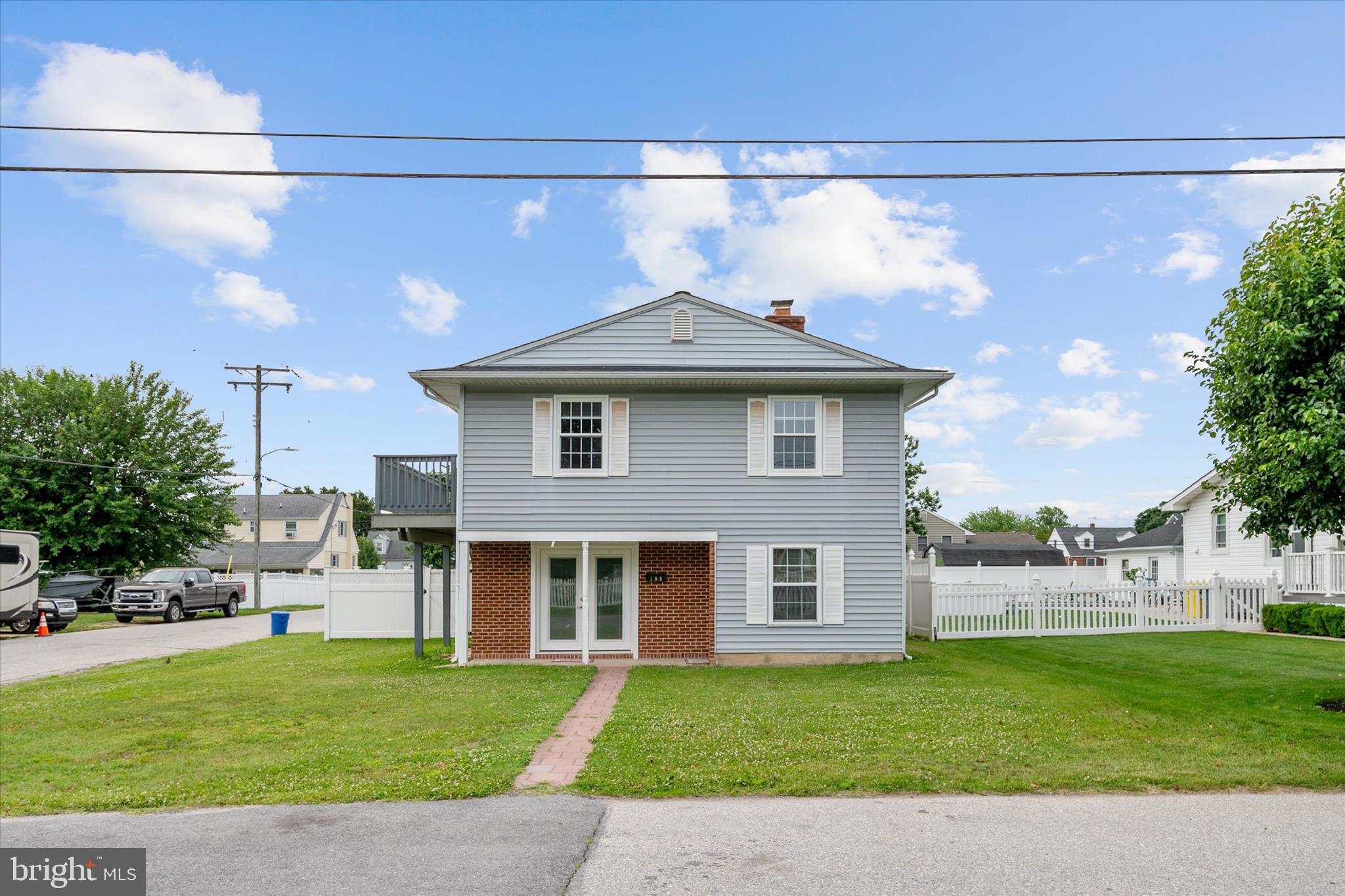 Welcome to this versatile 5-bedroom, 2-bath home in the sought-after Riviera Beach community! Offering a unique layout with two full kitchens, this property is ideal for multigenerational living, extended family, guests, or those seeking additional flexibility. The main level features a kitchen, living area, and two convenient bedrooms, while the upper level offers a second kitchen and three additional bedrooms, providing privacy and independent living options.

Step outside and enjoy your own backyard retreat with an in-ground swimming pool, perfect for summer entertaining, relaxing weekends, and creating lasting memories. Located just three blocks from the water, you'll love the easy access to waterfront activities. Conveniently close to shopping, dining, and commuter routes.