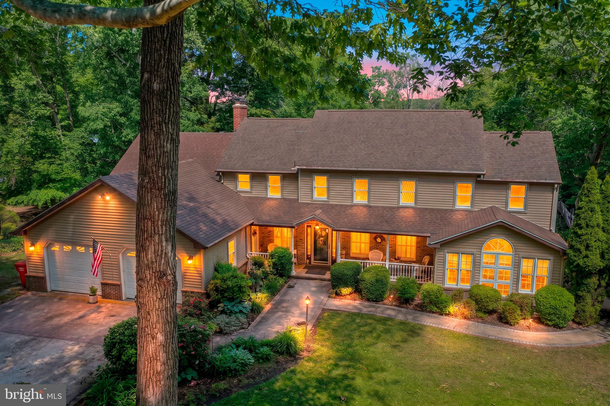 Welcome to an exceptional custom contemporary retreat set on 1.2 private acres in the sought-after community of Nanticoke Acres, offering the rare luxury of private river access—perfect for boating, kayaking, fishing, or simply enjoying peaceful days along the water. With over 4,500 square feet of thoughtfully designed living space, this impressive residence seamlessly blends timeless character, architectural detail, and modern comfort in a serene, nature-filled setting.

From the moment you enter, you’re greeted by soaring vaulted ceilings, abundant natural light streaming through skylights, and rich hardwood and stone flooring that create a warm yet sophisticated ambiance. The heart of the home features an inviting gathering space anchored by a wood-burning fireplace, ideal for cozy evenings or elegant entertaining. Multiple living and dining areas provide exceptional flexibility for both intimate gatherings and large-scale hosting.

Step outside to your own private outdoor oasis, where a sparkling in-ground pool and expansive outdoor living areas invite relaxation and unforgettable summer gatherings. Surrounded by mature trees, the property offers a rare sense of privacy and tranquility, while exclusive private river access allows you to fully embrace the waterfront lifestyle just steps from your door.

Additional highlights include a spacious 2-car attached garage, versatile outbuildings, a partial basement, and generous driveway parking. This remarkable property presents a rare opportunity to enjoy refined living, outdoor recreation, and private waterfront access in one truly exceptional setting.