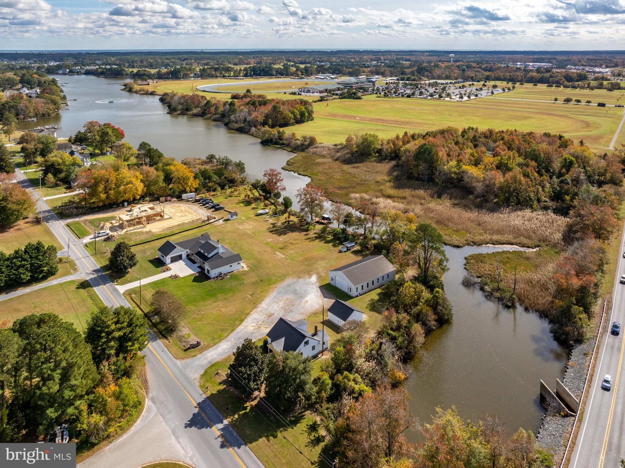 Discover the perfect blend of peace, space, and convenience with this rare waterfront opportunity on Turville Creek. This versatile property features a charming single-family home, a detached garage, and a large warehouse offering endless possibilities for personal use, storage, or business potential. The home has been a rental and could use a little love and a personal touch, but it has great bones and plenty of charm waiting to be refreshed. Even better, the property is already rented for the season, giving you the opportunity to capitalize on approximately $52,000 in rental income. Enjoy peaceful creek views and direct water access, perfect for kayaking, boating, and watching the sunset over the water. The location couldn’t be better—just minutes from Ocean City’s beaches, Ocean Downs Casino, and the historic town of Berlin, MD. Whether you’re looking for a private waterfront retreat, a property with plenty of storage and workspace, or an investment with incredible potential, this property delivers it all. Ask about current rental numbers and see the income possibilities for yourself!