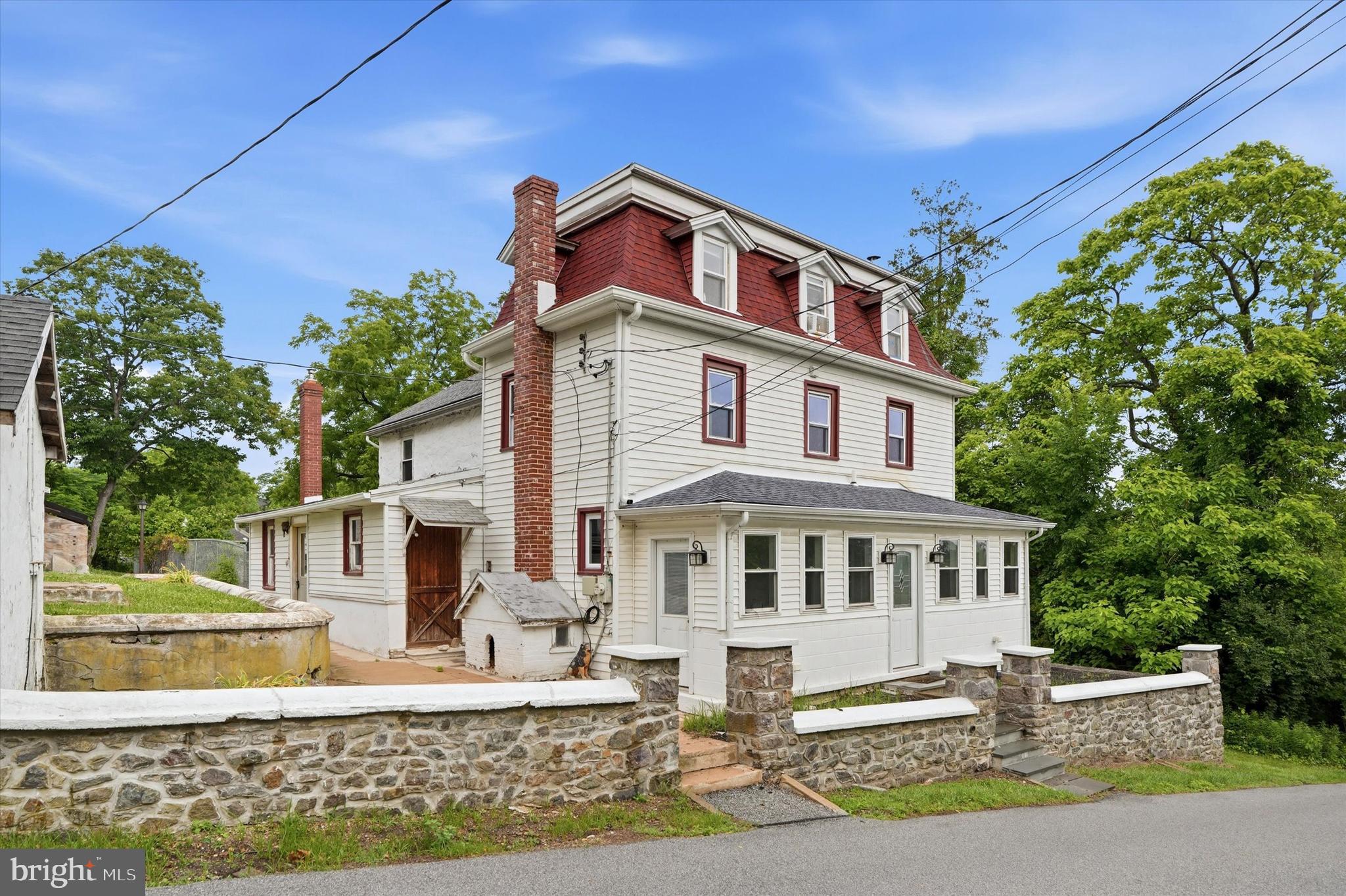 Nestled on a prominent corner lot in one of the area’s most desirable locations, this historic property in Valley Forge offers endless possibilities for investors, entrepreneurs, or buyers seeking a one-of-a-kind property rich with character and potential. Just minutes from Valley Forge National Historical Park, this unique opportunity combines history, visibility, land, and flexibility all in one exceptional package.
The property features a charming historic building filled with timeless character, a large detached garage ideal for contractors, car enthusiasts, storage, or workshop space, and an expansive parcel of land with potential subdivision opportunities (buyer to verify with township).
Whether you envision restoring and preserving its historic charm, exploring development potential, or building a private compound in Valley Forge, the possibilities here are truly endless. Conveniently located near major routes, shopping, dining, recreation, and the vibrant downtown Phoenixville scene, this is a rare opportunity to own a landmark-style property in an unbeatable location.