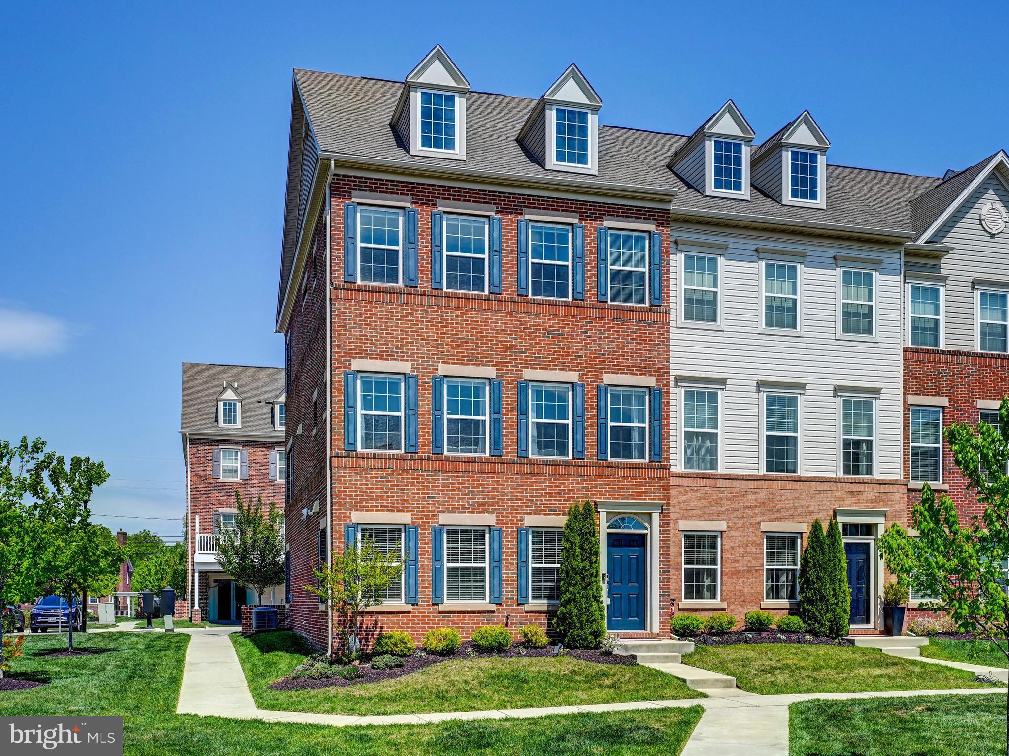 *** NEW PRICE $495,000 - 
Welcome to this exceptional end-of-group townhouse which is larger the larger sized Townhoome located at 5000 John Buck Avenue in the highly sought-after Honeygo area of Perry Hall. Perfectly positioned within a vibrant and convenient community, this home offers an impressive blend of modern design, thoughtful upgrades, and refined finishes throughout.
Bathed in natural light from multiple exposures thanks to its end-unit positioning, the home feels bright, open, and welcoming from the moment you enter. The main level showcases a highly desirable open-concept layout that seamlessly connects the living, dining, and kitchen spaces—ideal for both everyday living and effortless entertaining.
The heart of the home is the stunning chef’s kitchen  gas stove, featuring a crisp white design elevated by a Carrera quartz  countertop and backsplash, a striking 16-foot oversized island, stainless steel appliances, and a sleek range hood. Abundant cabinetry and generous prep space make this kitchen as functional as it is visually impressive, with the island serving as a natural gathering point for family and guests alike.
Just off the main living area, step out onto the composite deck—perfect for outdoor dining, relaxing, or entertaining while enjoying a low-maintenance outdoor space.
The adjoining living and dining areas are spacious and filled with natural light, creating an airy and inviting atmosphere that enhances the home’s open flow.
Upstairs, the home continues to impress with well-proportioned bedrooms and thoughtfully designed spaces. The primary suite offers a true retreat, complete with a walk-in closet and a spacious ensuite bathroom  featuring a double sink vanity and well-appointed finishes that elevate everyday living.
Additional highlights include an oversized two-car garage with ample storage space, 2 year old washer and dryer and a home that shows excellently throughout.
Updated gas stove updated 2024, washer and dryer 2025.
Ideally located near shopping, dining, parks, and major commuter routes, this property combines convenience with upscale suburban living. A rare opportunity in Honeygo, this beautifully appointed end of group townhome offers space, style, and sophistication. Welcome home!