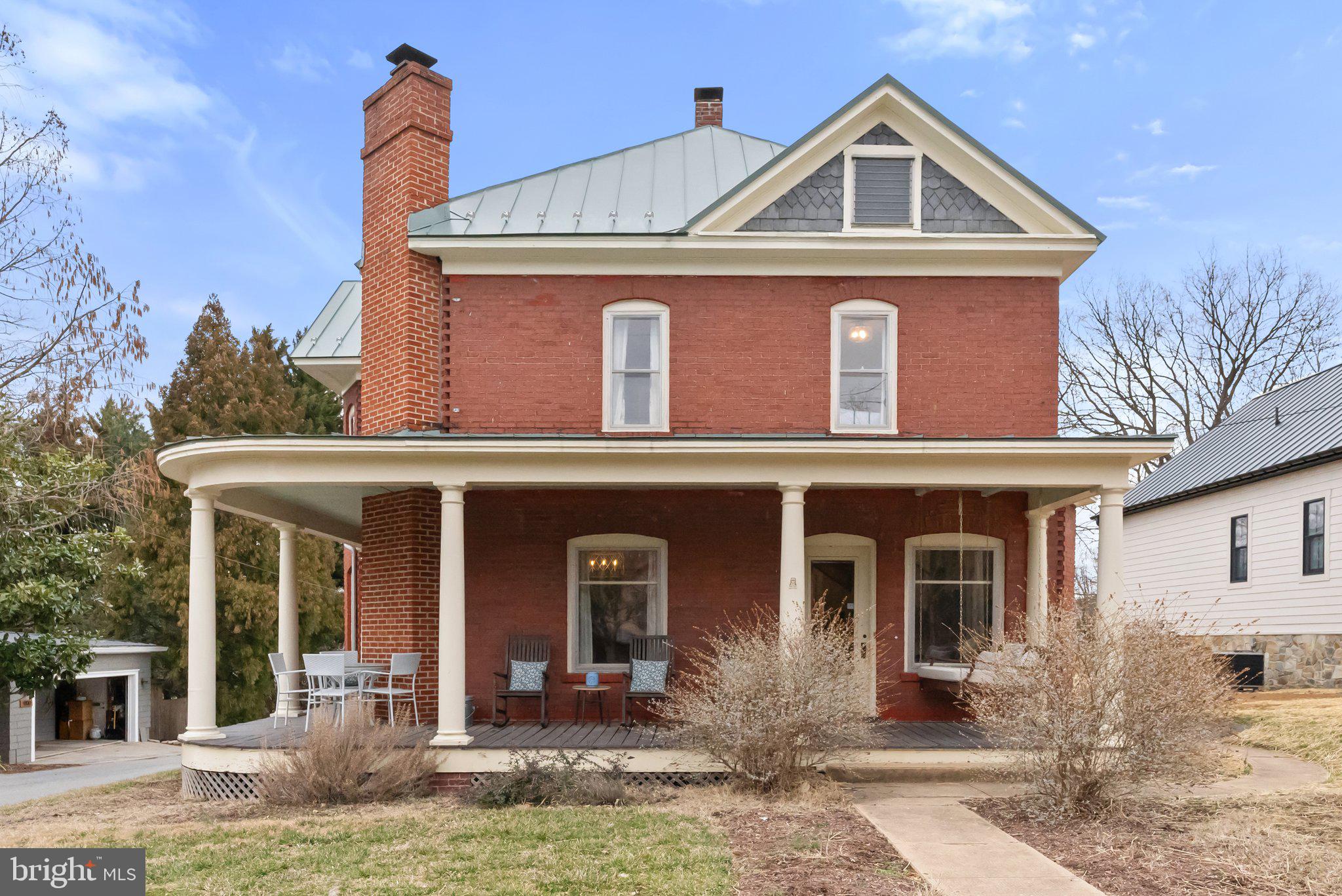 Step into history with this beautiful c 1912 Queen Anne Revival, where timeless craftsmanship meets modern comfort on a quiet street in the Harpers Ferry Historic District. Perfectly situated within walking distance to the town’s rich history, charming shops, inviting cafes, diverse restaurants, and endless outdoor adventures — Bolivar Bread Bakery  is just around the corner! A grand foyer welcomes you, featuring a one-of-a-kind mural that adds a striking artistic touch, elaborate original staircase, and powder room. From there, step into an expansive living room bathed in natural light, complete with built-in bookshelves that add both character and functionality. The elegantly appointed dining room offers access  to a tastefully renovated kitchen. Designed with thoughtful detail, the kitchen boasts a custom breakfast nook and handcrafted table by Little Cove. Upstairs, four bedrooms offer both privacy and tranquility, each framed by oversized windows. A beautifully renovated bathroom, featuring a classic clawfoot tub, tile, and a custom-built sink, blends historic elegance with modern convenience. Operated as a successful Airbnb and potential to purchase a turnkey business. Renovation highlights include refinished hardwood floors, new standing seam metal roof in 2021, new HVAC in 2022, and fully renovated kitchen and bathrooms. Whether as a primary residence, weekend retreat, or investment, this is a rare opportunity to own a piece of one of America’s most picturesque and historically rich towns. Nestled  at the confluence of the Potomac and Shenandoah Rivers, the district offers  breathtaking scenery, well-preserved 19th-century architecture, and a peaceful atmosphere that attracts history lovers, outdoor enthusiasts, and those seeking a quieter pace of life.