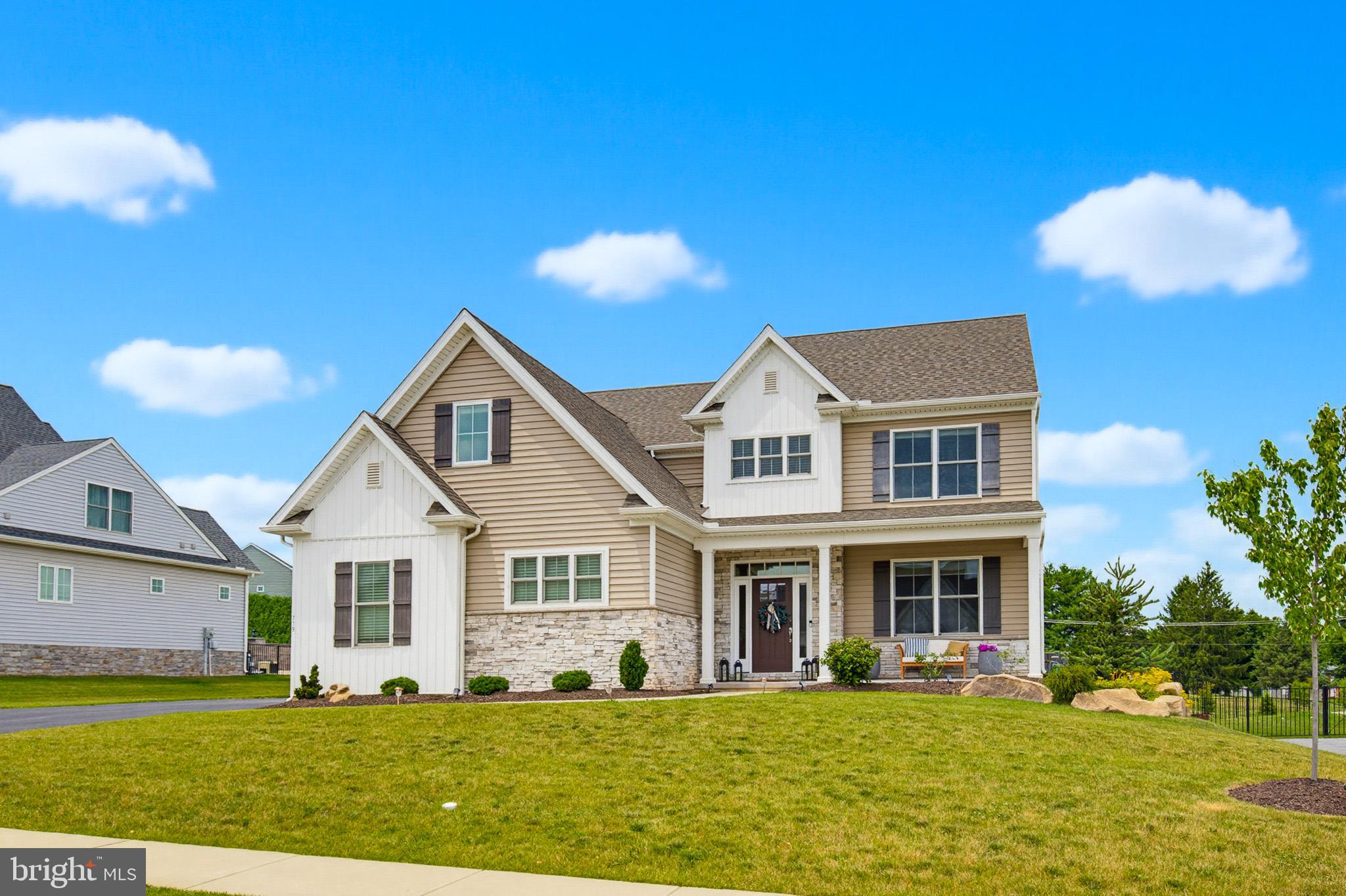 Experience the perfect blend of luxury, comfort, and thoughtful design in this exceptional custom-built home by Phil Carpenter Homes. Built in 2023, this beautifully maintained residence offers over 3,900 square feet of finished living space in the highly sought-after Farmbrooke Meadows community, within the Central York School District. The current owner has meticulously maintained every inch of this home, and it truly shows- it presents as though it has never been lived in.  


From the moment you step inside, you’ll appreciate the bright, open layout designed for both everyday living and effortless entertaining. Luxury vinyl plank flooring extends throughout the main level, where the spacious family room is anchored by a cozy electric fireplace and flows seamlessly into the dining area and impressive kitchen. Home chefs will love the oversized island, granite countertops, stainless steel appliances, soft-close cabinetry,  double stove, and generous walk-in pantry, making this space as functional as it is beautiful.  


The second floor offers five spacious bedrooms, including a private owner’s retreat featuring a large walk-in closet and an elegant en-suite bath complete with dual vanities, a soaking tub, and a walk-in shower. A well-appointed laundry room with built-in cabinetry, countertop space, and a utility sink adds convenience to your daily routine.  


The finished lower level provides incredible flexibility, offering an expansive recreation room already wired for surround sound, a full bathroom, and additional storage space. Whether you’re hosting game day, creating the ultimate media room, or setting up a home gym, this level is ready to fit your lifestyle.  


Outside, enjoy the peaceful setting from the covered front porch or unwind on the covered rear patio, complete with a ceiling fan and lighting for comfortable outdoor living. An attached three-car garage provides ample space for vehicles, storage, and hobbies. This home is also equipped with an electric breaker switch, which provides access for the home to be fully powered by a whole-home generator-allowing for emergencies not exist! 


Conveniently located near I-83 and Route 30, with easy access to shopping, dining, and everyday amenities, this move-in ready home combines modern convenience with exceptional craftsmanship in one outstanding package.  


If you’ve been searching for a home that offers the feel of new construction without the wait, this is an opportunity you won’t want to miss. Impeccably cared for, thoughtfully designed, and truly move-in ready, this home is ready to welcome its next owners.