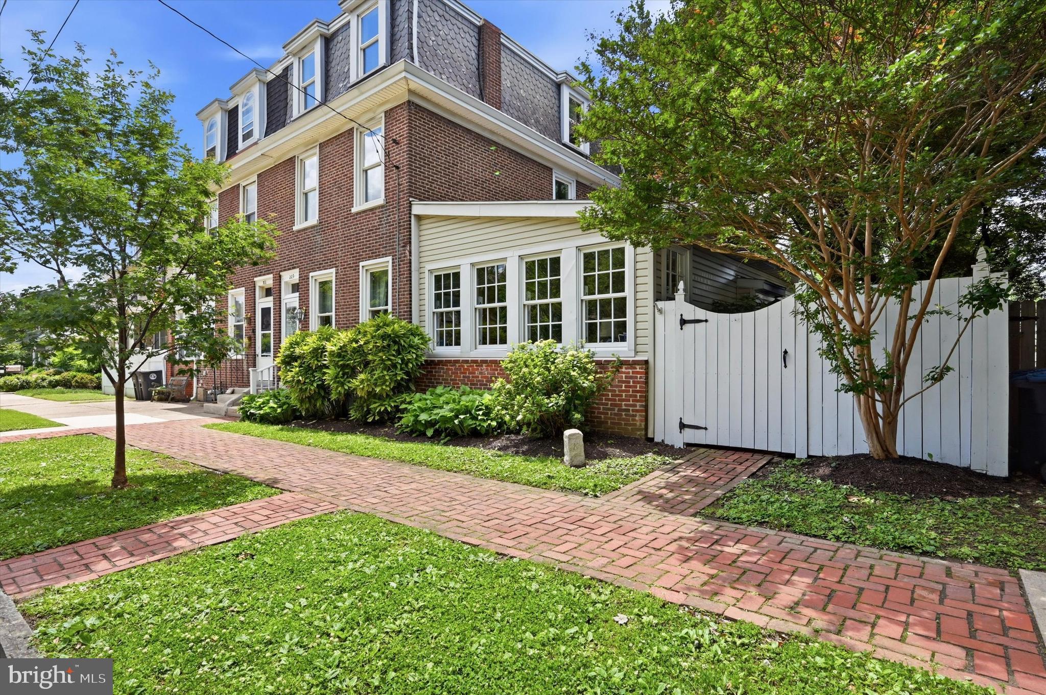 Rich in charm and filled with natural light, this exceptional residence showcases high ceilings,
hardwood floors, detailed trim work, and inviting spaces throughout. Timeless character and
thoughtful updates, including built-ins and closets, perfectly blend in this one-of-a-kind
Conshohocken twin, offering approx 2616sf of beautifully designed living space.

Features include a gracious formal living room anchored by a lovely fireplace surround, and a
formal dining room accented by beautiful built-in bookcase and cabinet, ready to host all your
special occasions. The heart of the home is the truly special family/great room with a gas
fireplace and window seat, creating a warm and inviting space filled with natural light and
seamless access to the lovely yard. The updated eat-in kitchen features a large center island,
granite countertops, stainless steel appliances, and a window seat and picture window
overlooking the spectacular rear yard. Just off the kitchen, a thoughtfully designed mudroom
adds convenience and functionality featuring a built-in hutch/pantry, laundry, and powder room
to complete the main level. Upstairs, the second floor offers three spacious bedrooms and an
oversized, updated, hall bath. The third floor features two additional bedrooms, providing
incredible flexibility for guest space, creative studios, or separate work-from-home offices, not to
mention the incredible views!

Outdoor living is equally impressive, with deck access from the mudroom overlooking the large,
fenced-in delightful yard and surrounding townscape. Mature trees and landscaping provide
ample shade for those warm sunny days. A separate patio/grilling area and your very own private
reading nook create multiple outdoor spaces to relax, entertain, and unwind.

You’ll fall in love with the proximity to vibrant downtown Conshohocken—enjoy easy walking
access to popular restaurants, shopping, playgrounds, the farmers market, July 4th parade and
fireworks and more!

A rare opportunity to own a home filled with love, character and space, in an unbeatable
location. Welcome Home!!