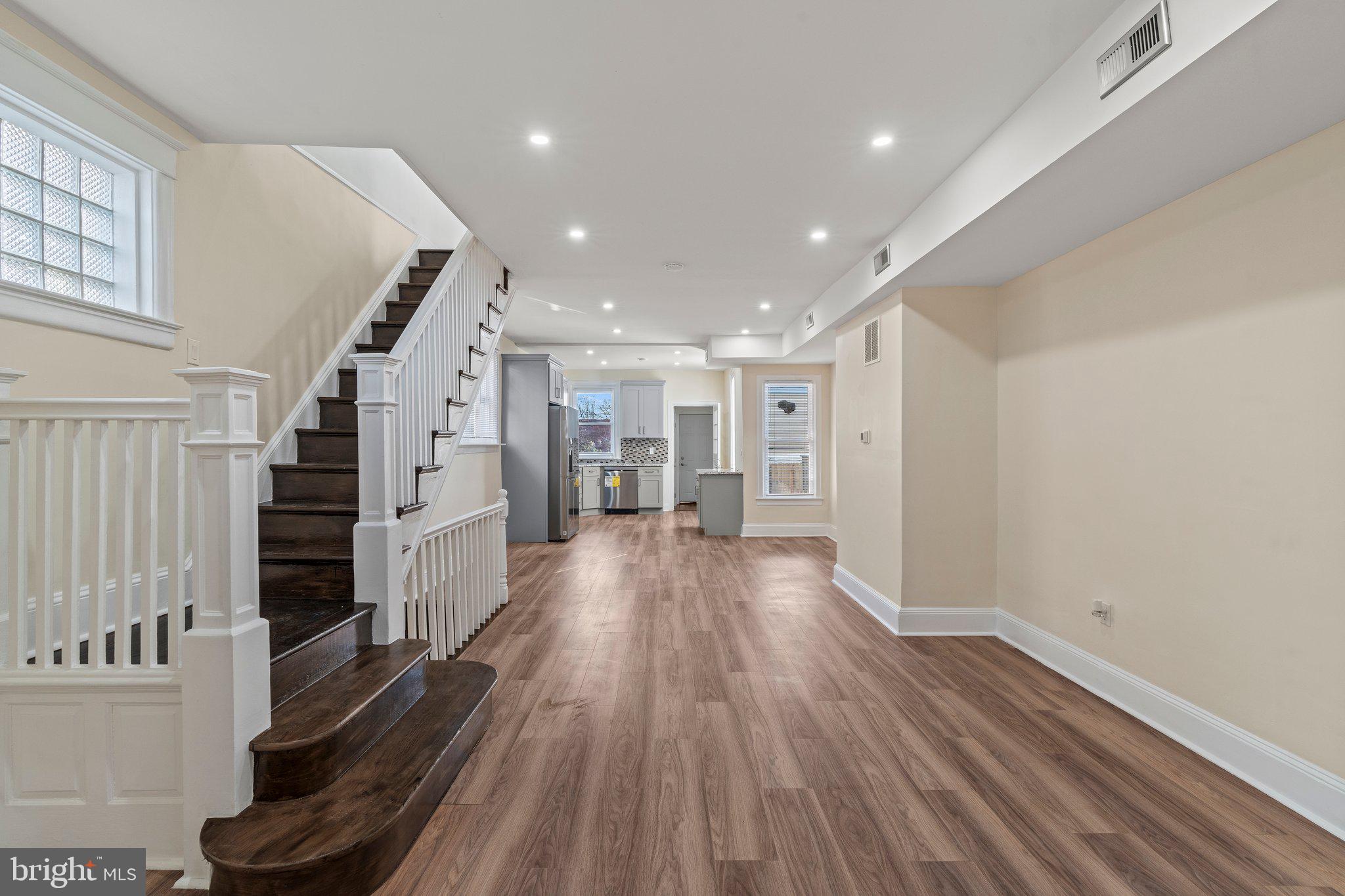 **Charming Renovated 4-Bedroom Home with Modern Touches**  
Welcome to this beautifully renovated four-bedroom, two-full, and one-half-bathroom home that combines modern amenities with timeless charm. This property stands out with three separate entrances, offering flexibility and accessibility for modern living. 

 Step through the inviting vestibule into a bright and airy living space, perfect for entertaining or relaxing.  
The main level boasts an open floor plan with a spacious living room/dining area, and an updated kitchen featuring sleek countertops, stainless steel appliances, and ample cabinet storage.  Upstairs, you’ll find three generously sized bedrooms. The finished basement has a bedroom along with a convenient full bathroom.  Outside, enjoy a private backyard ideal for gatherings or quiet moments. Located in a desirable neighborhood close to schools, parks, and shopping, this home is a must-see!