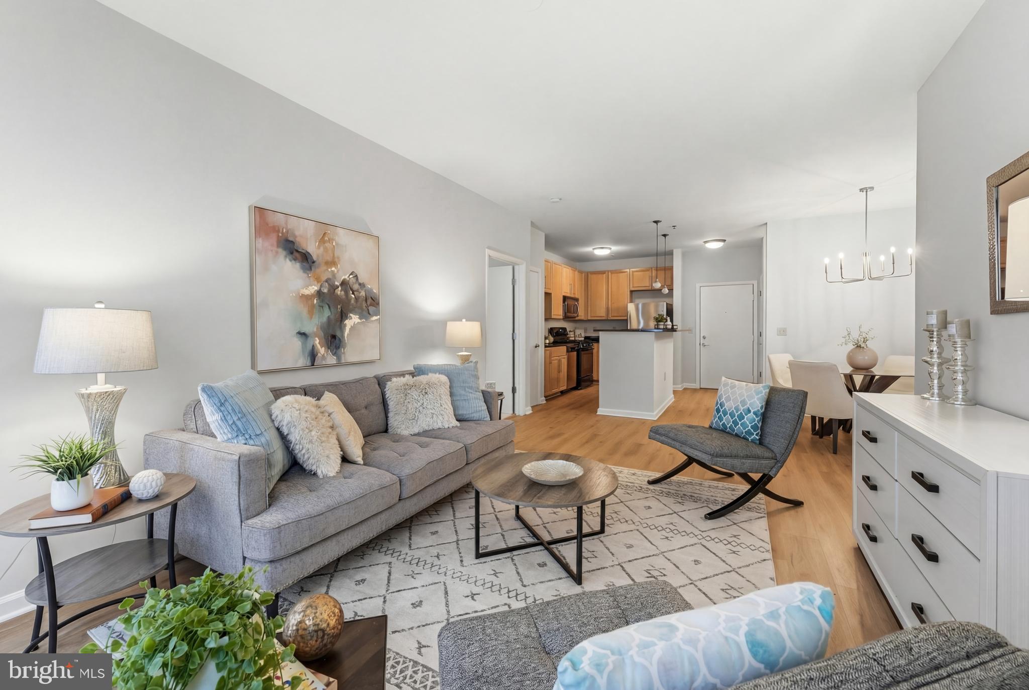 ****2 PARKING SPACES INCLUDED!!!  SELLER WILL PAY 6 MONTHS OF CONDO FEES with accepted offer!!  A refined, turnkey opportunity in the heart of downtown Silver Spring, this beautifully updated 2-bedroom, 2-bath residence in sought-after Silverton offers the perfect blend of comfort, convenience, and lifestyle.

Positioned on the third level with elevator access, this light-filled home has been recently refreshed with new paint, updated flooring, and modern lighting, creating a clean, elevated feel that is truly move-in ready. The thoughtfully designed open layout lives both spaciously and intuitively, with a kitchen that anchors the main living space—featuring a center island, ample cabinetry, and seamless flow into the living and dining areas for both everyday living and effortless entertaining.

The primary suite is a true retreat, complete with a generous walk-in closet and private ensuite bath, while the second bedroom and full bath provide ideal flexibility for guests, a home office, or both.

Additional highlights include in-unit washer and dryer and the rare value-add of two numbered parking spaces — an exceptional offering for this location.

Silverton residents enjoy a full suite of amenities, including a fitness center, outdoor pool, common grounds, and professional on-site management, all within a pet-friendly community.

Just moments from Metro, Whole Foods, dining, shopping, and the vibrant energy of downtown Silver Spring, this home offers the ideal combination of urban convenience and easy living.

With its generous layout, recent updates, in-unit laundry, and two parking spaces, this home represents a standout value at this price point in today’s Silver Spring market.