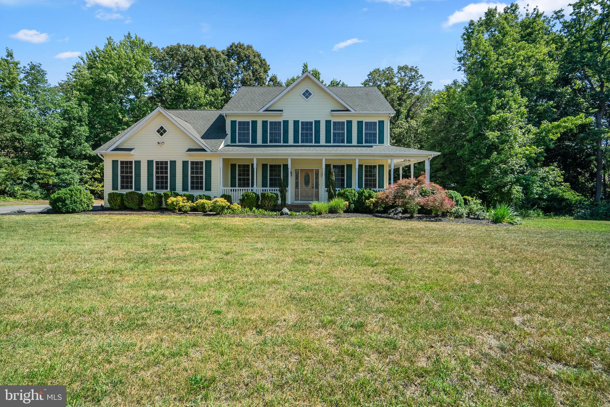 Nestled on 3 private acres in the desirable Willow Creek community of Hughesville, this spacious Colonial offers the perfect blend of peaceful country living and everyday convenience. Backing to mature trees with a picturesque creek running through the property, this home provides a serene retreat while remaining close to shopping, dining, schools, and commuter routes. Freshly painted with new carpeting, this move-in ready home offers over three levels of comfortable living space designed to accommodate today's lifestyle. The main level features a sought-after bedroom, ideal for guests, multigenerational living, or a private home office. The open-concept floor plan flows seamlessly through the spacious living areas and into the large kitchen, complete with stainless steel appliances, abundant cabinetry, and plenty of workspace for cooking and entertaining. Just off the kitchen, the sunroom is filled with natural light and offers beautiful views of the wooded backyard and creek, creating the perfect place to enjoy morning coffee or unwind at the end of the day. Upstairs, you'll find generously sized bedrooms and ample space for family and guests. Outside, the side-load garage, oversized driveway, and generous parking area offer plenty of room for vehicles, boats, RVs, and other recreational equipment, with the added convenience of an existing RV electrical hookup. With no HOA restrictions, 3 private acres, a wooded setting, and a convenient Hughesville location, this property offers the space, flexibility, and privacy that are increasingly difficult to find in today's market. Conveniently located near Waldorf, La Plata, Joint Base Andrews, Pax River, Washington D.C., and Northern Virginia commuting routes. Experience the beauty of Southern Maryland living at its finest.