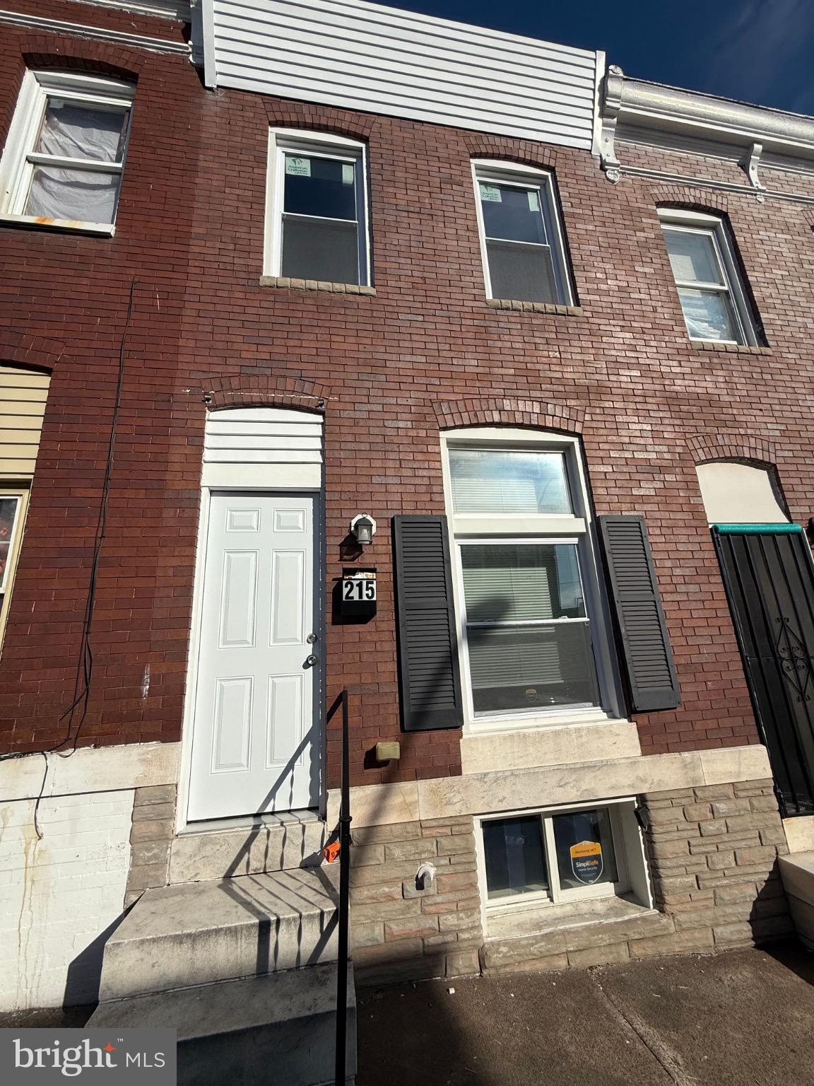 Welcome to 215 N Curley St, a beautifully renovated Baltimore townhome offering modern finishes and comfortable living space.

The property features luxury vinyl plank flooring throughout, fresh paint, and recessed lighting, creating a bright and modern feel. The fully updated kitchen includes granite countertops and stainless steel appliances, providing both style and functionality.

Upstairs you will find two spacious bedrooms, including a primary bedroom with an ensuite bathroom. The home includes 2.5 bathrooms, all updated with new tile surrounds and modern black hardware.

Additional upgrades include new doors and windows, new black ceiling fans, and a whole-home alarm system. The home is also equipped with central air and heat for year-round comfort.

Conveniently located near major commuter routes, Patterson Park, shopping, dining, and public transportation, this property offers easy access to everything Baltimore has to offer.