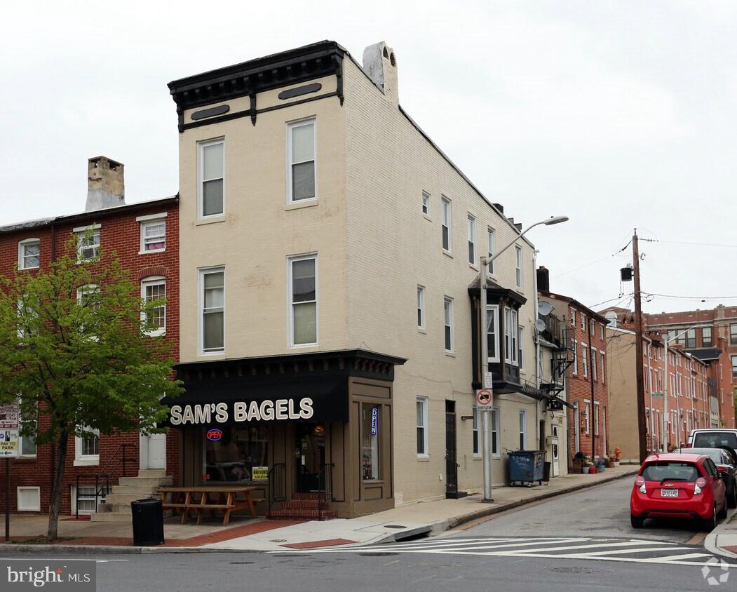 Well-maintained mixed-use property featuring storefront retail plus residential units, fully leased and income-producing. Located on Light Street in Federal Hill, this corner-lot asset offers excellent visibility, strong foot traffic, and convenient parking.

The street-level storefront is occupied by a well-known, popular retail business that is actively operating, drawing consistent customer traffic and enhancing long-term value.

Residential layout:

2nd Floor: 2 Bedrooms / 1 Bathroom

3rd Floor: 1 Bedroom + Den / 1 Bathroom with private balcony

Each residential unit includes in-unit laundry, separate water heater, and individual A/C system, providing tenant convenience and efficient operations.

Prime location with easy access to Inner Harbor, Baltimore Convention Center, and Baltimore Orioles’ Oriole Park at Camden Yards. The area’s popularity continues to grow, making this an attractive opportunity for investors seeking a stabilized asset in a high-demand corridor