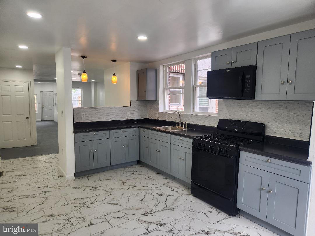 Welcome to this beautiful three-bedroom, two-and-a-half-bath townhome located in the heart of vibrant Philadelphia. Blending modern comfort with classic city charm, this spacious home offers an open and inviting floor plan perfect for both everyday living and entertaining. Enjoy the convenience of a main- level powder room. Upper level consists of three generous sized bedrooms and a beautifully renovated full bathroom. The kitchen has been completely renovated, along with new bathrooms, windows, heater, water heater, electric and roofing. Seller is in the process of having brand new plush carpet installed on the main floor. Unpack your bags and move right in. Schedule your appointment today!!!