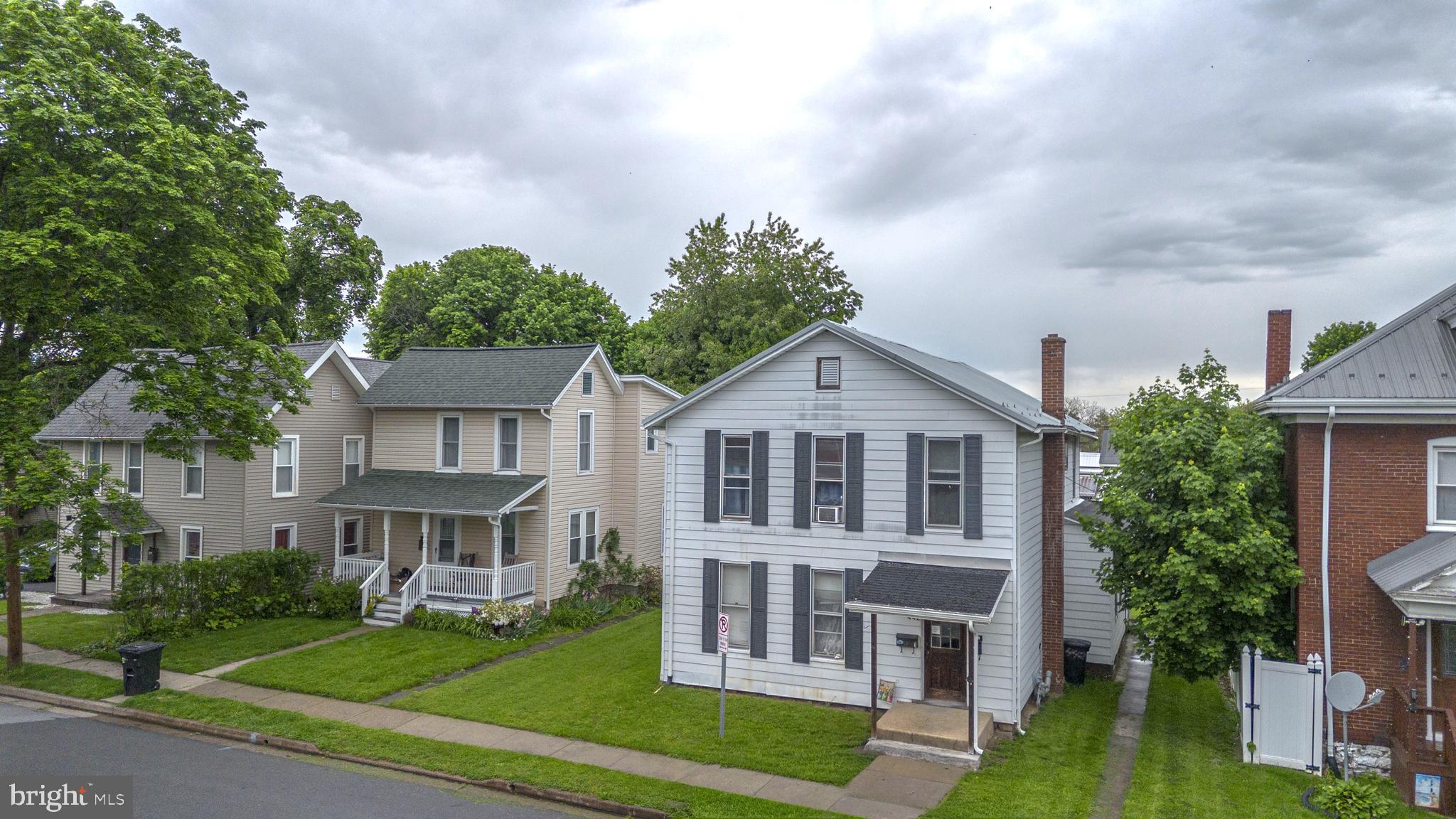 This duplex in Lock Haven presents an excellent investment opportunity with both units currently leased through November 2026, providing immediate rental income. The main level unit features 2 bedrooms, 1 full bath, an eat-in kitchen, and oil forced-air heat. The second-floor unit also offers 2 bedrooms and 1 full bath and is heated with electric baseboard heat. Off-street parking is available for both units. The property also features a newer roof for added peace of mind. Seller is offering a $5,000 credit toward separating the electric service into individual meters. Whether you’re looking to expand your portfolio or start investing in income-producing property, this well-maintained duplex is worth a look.