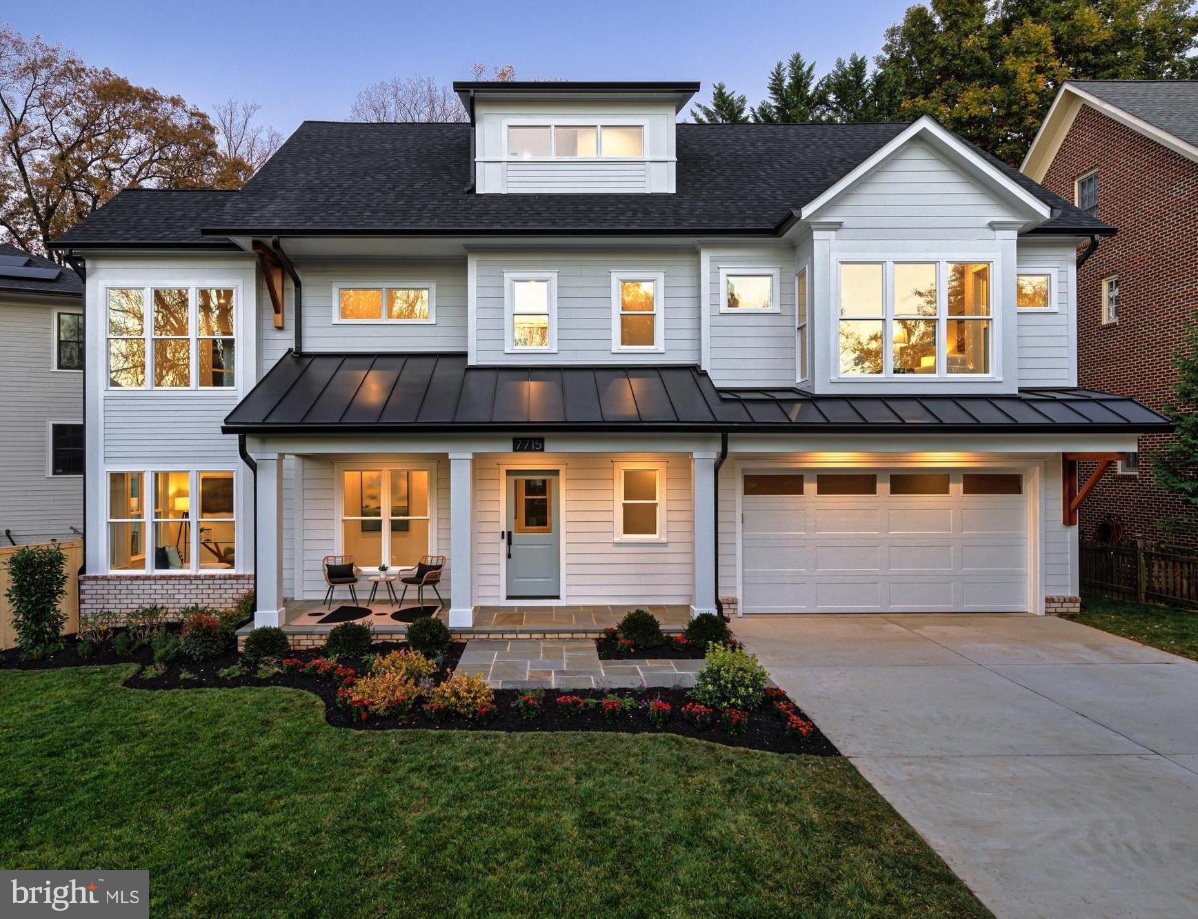 Experience modern luxury at 7715 Radnor Road, another stunning new home by Meridian Homes. Located in Bethesda's desirable English Village neighborhood and the top-rated Walt Whitman school district, this Modern Colonial offers 5,048 square feet of living space. With 5 bedrooms and 6 ½ bathrooms on 4 well-designed levels all connected by a custom elevator, this home is the perfect blend of comfort, style and function. Upon entering through the inviting covered porch, the main level welcomes you with a gourmet kitchen crafted for the culinary connoisseur. Anchored by a stunning central island, this chef’s paradise features high-end Sub-Zero and Wolf appliances, ceiling-high custom cabinetry, and sleek quartz countertops. Flowing effortlessly into the open-concept dining (with seating for 10 or more) and family room combo, this inviting space with its coffered ceiling and contemporary linear fireplace offers an elegant escape, perfect for intimate dinners or grand gatherings. For those who work or study from home, the private office provides both privacy and functionality. Designed for easy living, the property is low-maintenance with professional landscaping, including evergreen screening trees and a beautiful flagstone hardscape, creating a serene outdoor space that requires very little upkeep. The upper level offers a luxurious primary suite with a cozy seating nook by a bay window, dual walk-in closets, and TWO spa-inspired primary en-suite bathrooms complete with an oversized shower, large soaking tub, and premium finishes. This level offers two additional bedrooms with en-suite bathrooms, and a convenient second-floor laundry room. The top-floor loft is filled with natural light and can serve as a playroom, home office, or gym. This level also includes a private bedroom and full bathroom. The lower level features a spacious recreation room and an additional bedroom with a full bathroom. Every level of this home shines with elevated details, from solid oak wide-plank floors to elegant 9-foot ceilings and custom millwork that add a warm and inviting ambiance. The exterior Modern Colonial architecture blends classic brickwork with durable concrete siding; and the close proximity to neighbors fosters a great sense of community. Just moments from downtown Bethesda, the Capital Beltway, and Washington, DC, this home also provides easy access to top-rated schools, making it both a luxurious and convenient choice. Don’t miss the chance to experience this remarkable residence—schedule your showing today to experience this stunning home firsthand!
