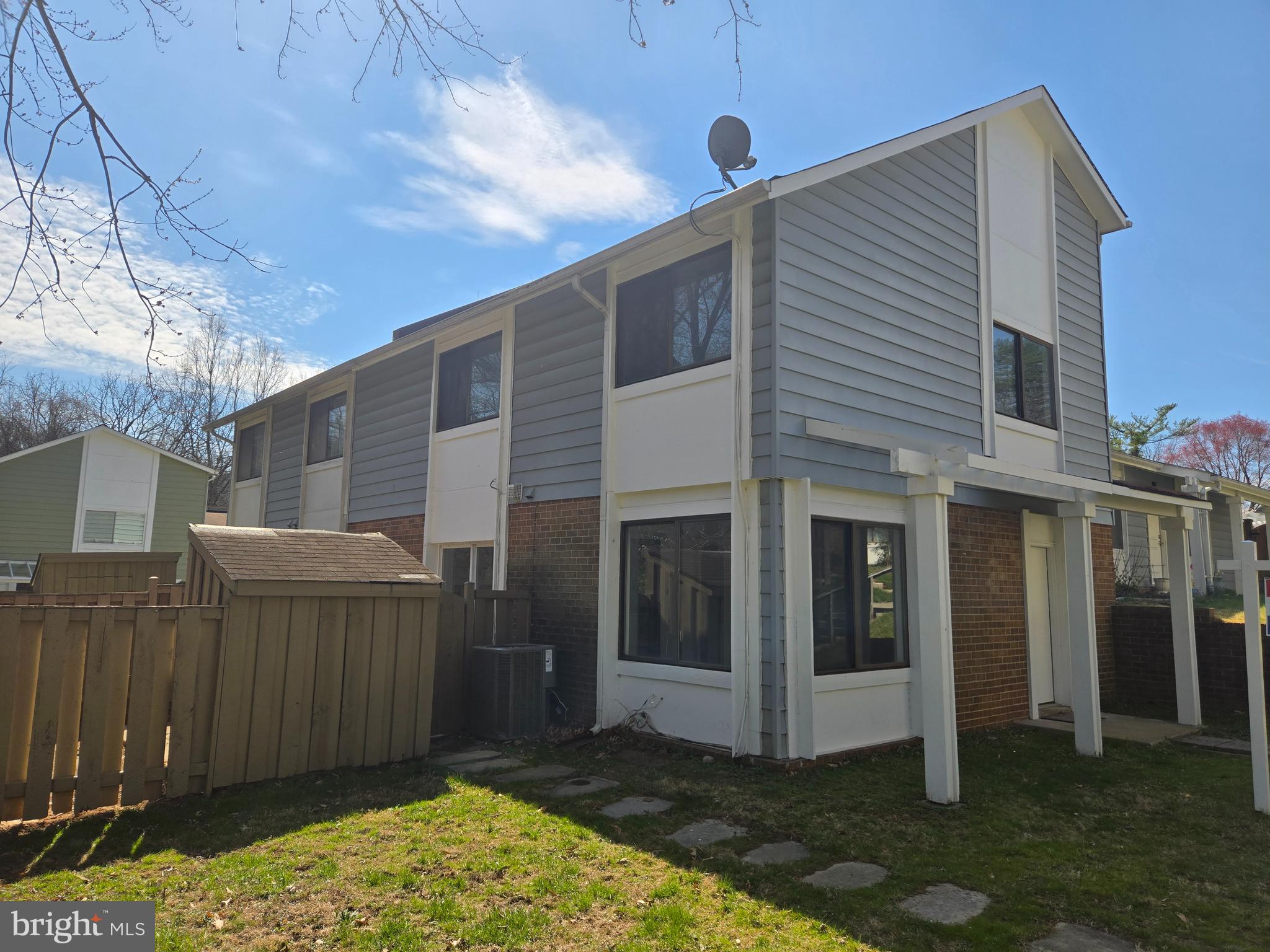 Spacious end unit townhome in move in condition featuring three large bedrooms. Great open floorplan on the main level. Huge patio with fenced yard. $60+K below market. Freshly painted, new carpet on bedroom level and laminated flooring throughout the main level!