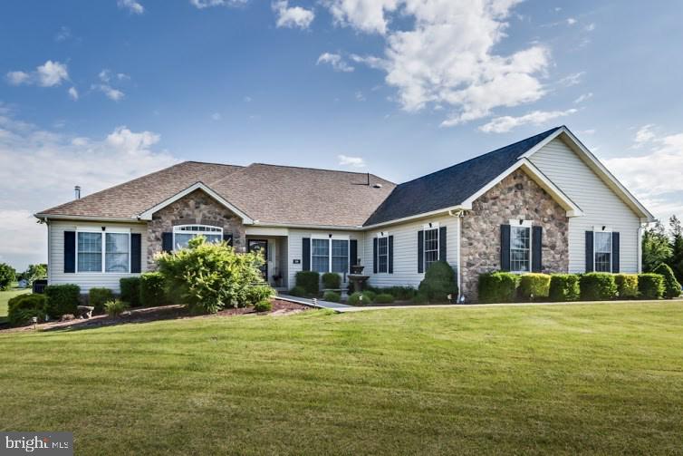 Expansive Rancher with guest quarter on 2 acres. This home is located in a gem of a neighborhood with each home being unique. In the country but easy commute to MD line and Rt.15, home is a must see for families with aging parent(s) or the Entertainer at heart, turn the in-law suite into a game room with wet bar! Dual zone heat/air, whole house generator, , Large deck/patio for entertaining, Huge 81' x 36' Basement w/work station.Over 6000 sq.ft.