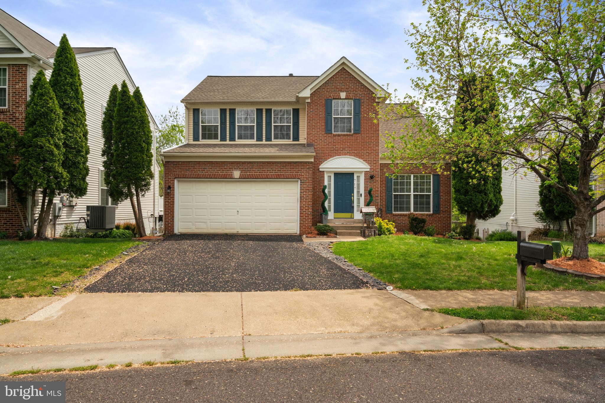 Welcome to this Beautifully Maintained Colonial in a Prime Cul-de-Sac Location. Nestled just steps from a quiet cul-de-sac and adjacent to a peaceful walking trail, this charming colonial offers privacy, community, and comfort. The home sits on a flat, open lot—ideal for summer gatherings and family fun. Step inside to a spacious and open floor plan featuring a bright kitchen with an eat-in area,  connected to the family room where a cozy gas fireplace and sliding glass doors offer views of trees. A separate formal dining room and living room provide additional space for entertaining or relaxing. Upstairs, the primary bedroom includes walk-in closets and a private bathroom. Conveniently located on the same level is a full laundry room, along with 3 additional bedrooms and a 1 shared full bath. The fully finished walk-out basement is perfect for guests or an in-law suite, complete with a bedroom, full bathroom, a spacious family room and its own private entrance.