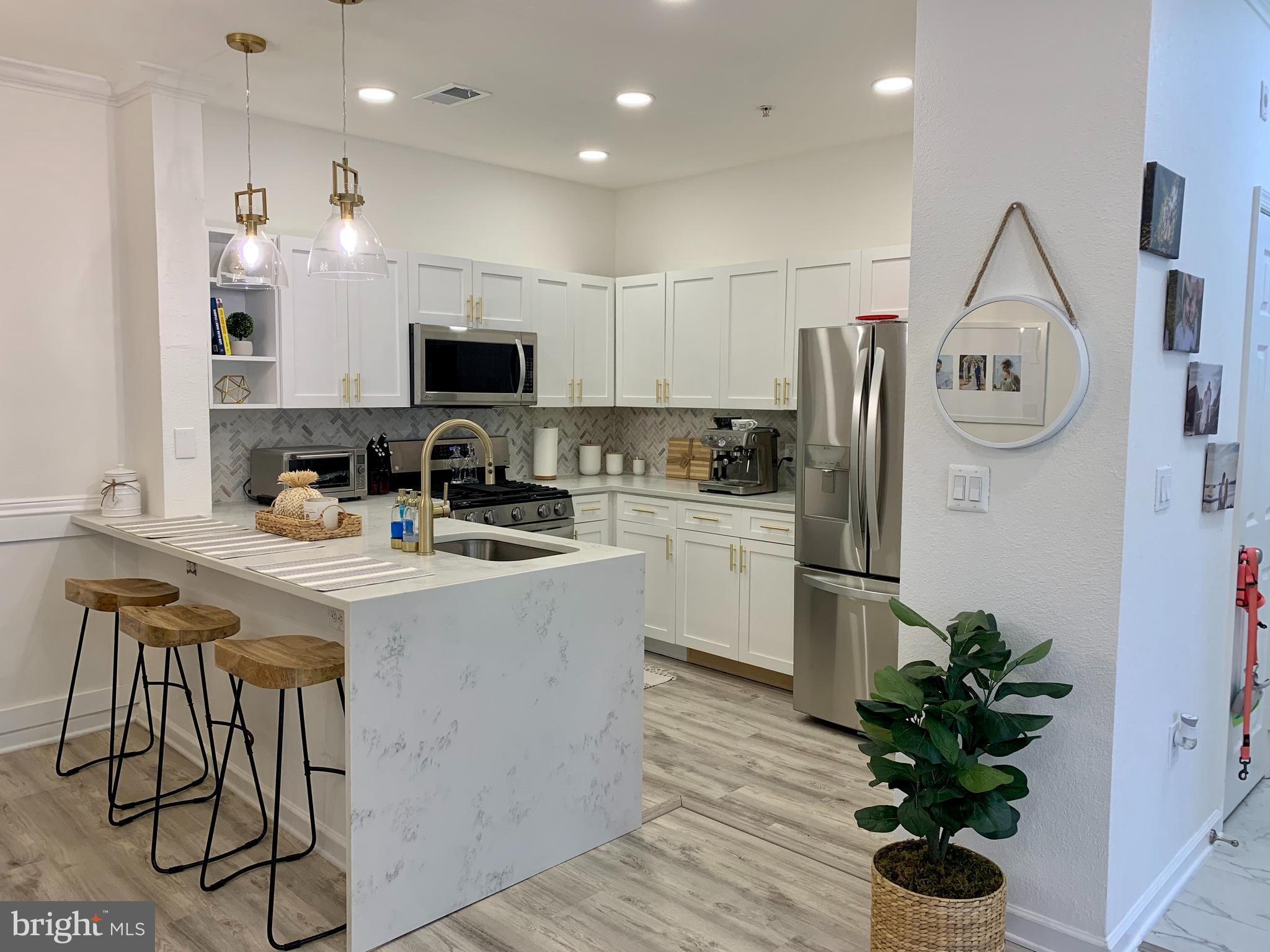 Rare 3-Bedroom Condo with Private Garage in Ashmore Germantown – Move-In Ready!

🚨 3-Bedroom Condos with a Private Garage Don’t Hit the Market Often – Don’t Miss This One!

Step into luxury and convenience with this fully renovated, open-concept condo, perfectly situated in the highly sought-after Ashmore Germantown community! Located on the 3rd floor with a private balcony, this home offers both modern upgrades and hard-to-find private parking options!

✨ Key Features:
✅ Private Garage + Driveway + 2 Reserved Parking Spots – A rare find in this community!
✅ Completely Renovated – Fresh paint, new recessed lighting, and luxury vinyl plank floors throughout.
✅ Modern Kitchen – Stunning quartz countertops, brand-new appliances, and an open layout overlooking the dining & living areas.
✅ Spacious Living Room – Cozy up by the gas fireplace or entertain at the bar with a new wine and beverage fridge + floating shelves.
✅ Work-from-Home Ready – A stylish nook in the hallway makes the perfect office space!
✅ Large Bedrooms & Storage – Two spacious guest bedrooms with large closets + a master suite with a walk-in closet and a gorgeous double-sink master bath.
✅ Resort-Style Amenities – Enjoy a fitness center, swimming pool, clubhouse, and business center.
✅ Convenient Parking & Storage – Private garage + driveway + 2 reserved parking spots + additional visitor parking close by.

🏡 Prime Location! Walking distance to grocery stores, restaurants, and retail shops. Plus, just 5 minutes to I-270 for an easy commute! 🌳🚶‍♂️

📍 3-bedroom condos with a private garage are RARELY available! If you’ve been searching for the perfect mix of modern upgrades, prime location, and unbeatable parking, this is it. Message me today to schedule a showing!