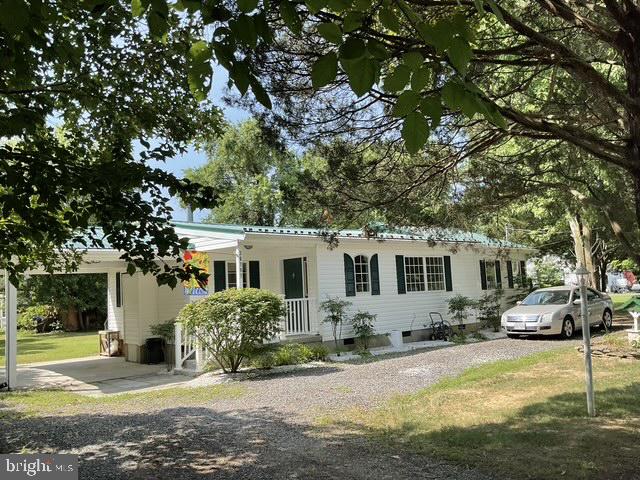 JUST REDUCED!!

This home is located in the tucked-away community of Longview Beach at 36797 Ricardo Drive, Bushwood, Maryland, and is currently priced at $340,000.00. Sitting on 10,500 sf. is just under 1/4 acre.   This recently updated home with great features for winter is the perfect location for the summer.  A new metal roof with lighting rods was installed in 2019, including upgrading installation in the attic/ceiling and exterior walls.  Home features a renovated eat-in kitchen with custom cabinets, a large kitchen counter area for breakfast, and new lighting that opens into the family room. The kitchen has access to the rear yard, and a covered carport or front porch area completes the living space.  

This gem is awaiting a new owner to enjoy all the benefits of just a short a quiet haven for all nature lovers to sip your morning coffee and watch the wildlife that passes by. In the early morning, you can take a walk down less than half a mile to the shoreline for some early morning fishing, drop your boat at the pier, or just enjoy the view of the Potomac River.

The home is located 
From Drive Time 1hour and 42 minutes from Washington, DC
From King George, Virginia, Drive time 45 Minutes
From Annapolis, MD, the Drive time is 1 hour and 48 minutes