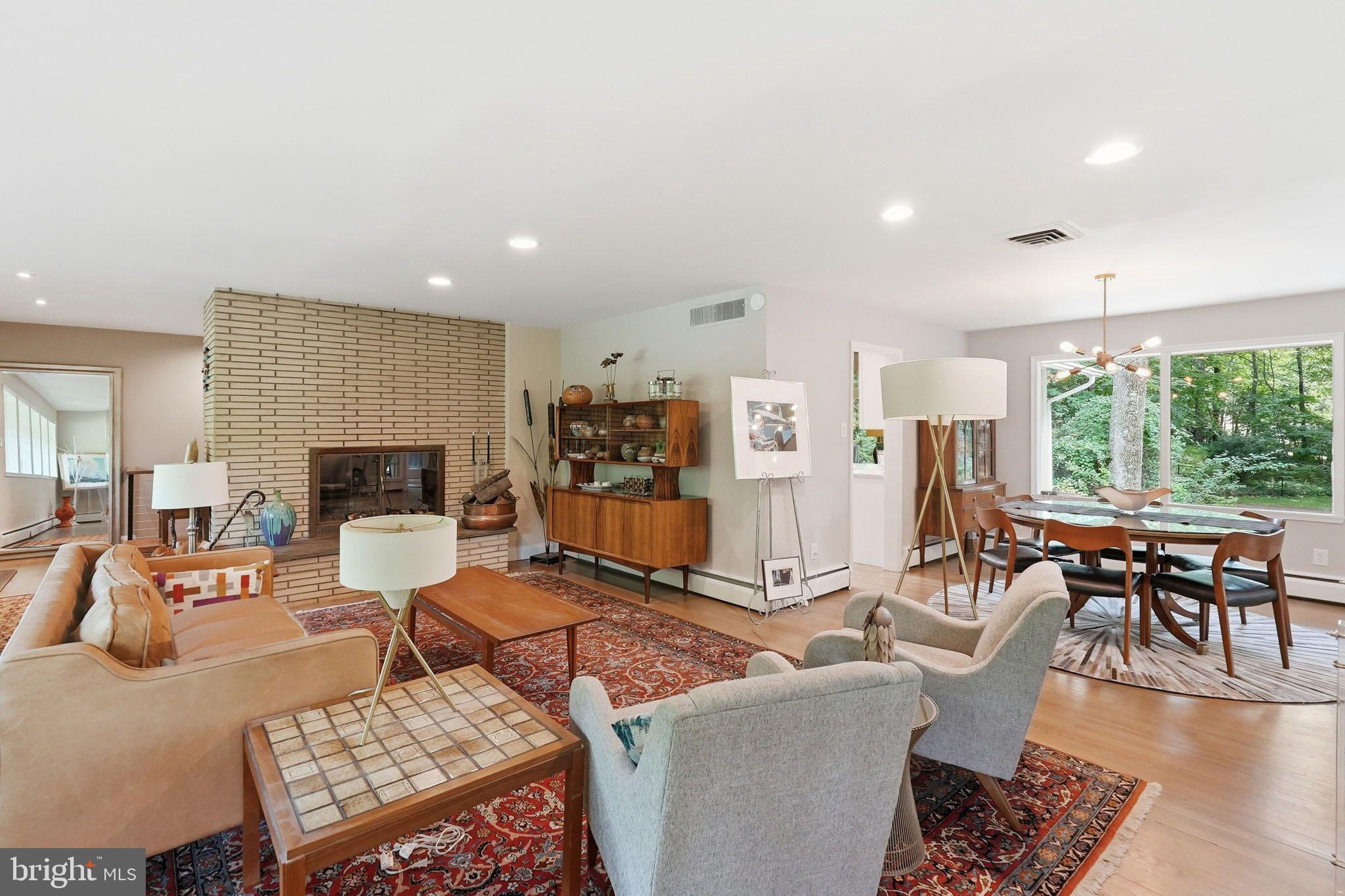 Set on a picturesque .75-acre lot in the heart of Potomac, this exceptional Mid-Century Modern home blends timeless architecture with warmth, character, and thoughtful updates throughout. Spanning just under 4,000 square feet across two levels, the home is filled with natural light and offers an inviting, airy feel from the moment you step inside. A stunning new kitchen completed in 2025 anchors the main level, while the breathtaking sunroom and expansive rear deck create the perfect spaces to relax, entertain, and enjoy the peaceful surroundings.

The dramatic family room showcases soaring vaulted ceilings and striking architectural lines that capture the essence of Mid-Century design. Upstairs, the spacious primary suite features an ensuite bath, alongside two additional bedrooms and a beautifully renovated hall bathroom. The walkout lower level offers incredible flexibility with a huge recreation room featuring a fireplace, a fourth bedroom, and an additional full bathroom, ideal for guests, work-from-home space, or multi-generational living. Beyond the home itself, the property offers rare outdoor potential, including a rear slab area that could be an incredible future pickleball or sport court. This is a rare opportunity to own a truly special home filled with personality, charm, architectural appeal, and room to make it your own in one of Potomac’s most desirable locations.