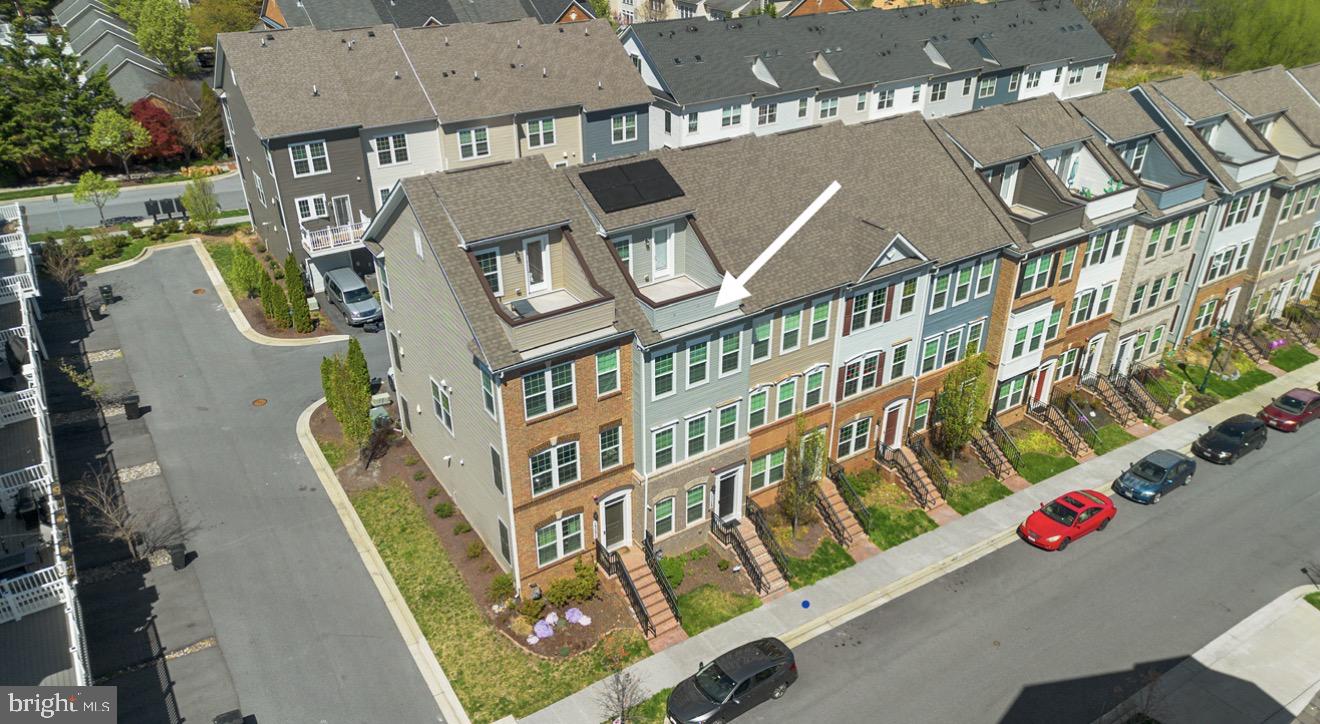 A rare four-story Pulte townhouse in Clarksburg Town Center, beautifully maintained and complete with owned solar panels. This stunning 6-year-old home offers two decks, including a private rooftop deck!
Inside, the entry level includes a versatile bedroom, a full bathroom, and access to the oversized garage. Upstairs, you’ll find a bright and open living and dining area with beautiful wood floors and abundant natural light. Built-in wireless speakers in the living room and loft ceiling set the tone for the home, filling the space with rich sound whether you're hosting or just unwinding. The kitchen is equipped with stainless steel appliances, a ceramic backsplash, and opens to a deck, perfect for morning coffee.
The third level features a spacious owner’s suite with a luxurious bathroom, complete with two sinks and a large walk-in shower with a bench.. The bedrooms feature new carpet, adding a fresh, move-in-ready feel. An additional ensuite bedroom offers its own private bath, so no one has to share.
The top level includes a loft with hardwood floors and access to the private rooftop terrace, creating a peaceful outdoor retreat. Just a block and a half from the future Clarksburg Town Center, where permits and site work are being finalized, with shopping and a grocery store on the way. Kings Pond is also nearby with a fishing pier and playground. What a fabulous walkable location!
Enjoy the community pool and clubhouse just in time for summer. Everything you need is close to home, plus a great commuter location just minutes to I-270.