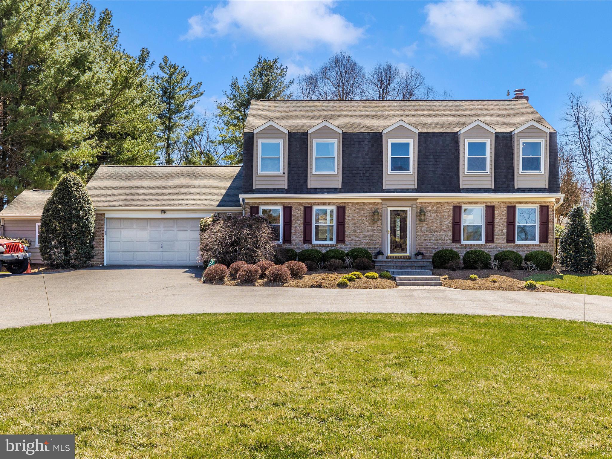 Welcome home to this expanded and beautifully updated Dutch Colonial in sought-after Goshen. Every time you step through the front door, you'll appreciate the inviting and versatile floor plan. The main level offers flexible living spaces, ideal for a home office, formal dining room, or living room—customize it to suit your needs.
This home is rich in character, featuring hardwood floors, sophisticated inlay molding, neutral paint selections, and recessed lighting. At the heart of the home is a stunning, updated center island kitchen with abundant cabinetry, generous counter space, and a stylish Wall Pops backsplash. The kitchen flows effortlessly into the expansive family room, complete with a striking stone wood-burning fireplace and direct access to an incredible backyard retreat—perfect for entertaining. The main level also includes a convenient half bath and a laundry area.
Upstairs, the primary suite boasts a spacious walk-in closet and a beautifully renovated en-suite bath with a dual-sink vanity, oversized shower, and additional storage. There are also three generous-size bedrooms, one of which includes a bonus sitting room with a private balcony overlooking the backyard—offering the potential for a fifth bedroom. A fully updated hall bath serves these rooms.
The walk-out lower level is designed for recreation and relaxation, featuring a spacious recreation room already equipped with a TV, recessed lighting and a stylish bar area. This level also includes a den/exercise room, a full bath, and multiple storage areas, making it both functional and inviting.
Step outside into your personal oasis. The meticulously landscaped 2.34-acre property showcases a gunite inground pool, a serene pond with a waterfall, and a beautifully designed outdoor living space. Enjoy the paver patio, firepit, and custom cabana—fully equipped with a grill, cooler, and TV—making it the ultimate entertainment space.
A circular driveway and two-car garage provide ample parking, while additional outdoor storage includes a dedicated shed for pool equipment and a 12' x 16' storage area. This home also features a generator for added peace of mind.
Offering a rare combination of luxury, comfort, and exceptional outdoor living, this property is truly a must-see!