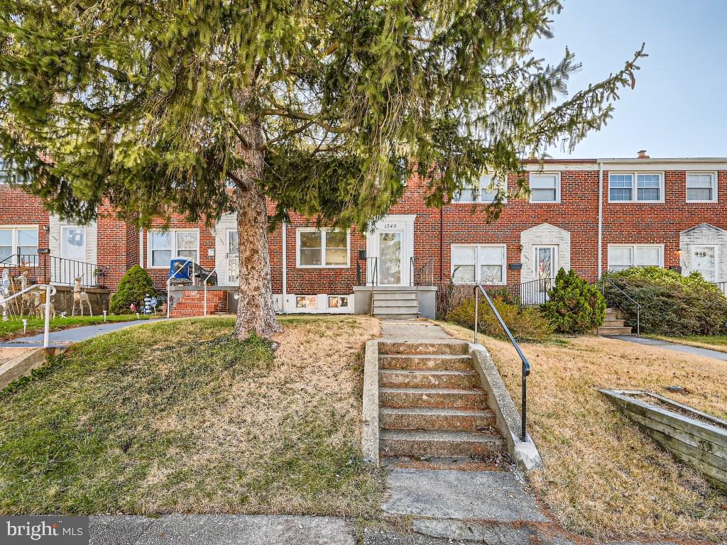 OPEN HOUSE CANCELED ... Newly renovated 3BR/2BA Townhome located in a quiet neighborhood.  Walk up to the large front porch and open the door into a spectacular home beaming with tons of natural light.  Glamorous flooring and a soft color pallet is featured throughout the main floor open, concept living room, spacious dining room, and stunning kitchen.  The kitchen boasts plenty of cabinets, stainless steel appliances, sleek stone countertops, and a peninsula offering a cozy breakfast bar with seating for two. New carpeting begins at the stairs leading to the second floor and into a spacious primary bedroom beaming with light, and two sizable secondary bedrooms. A beautifully tiled full bath completes this floor.  The lower level offers additional living space in a newly carpeted family room, full bath with a walk-in shower, a laundry room with a painted/sealed concrete floor, and a walk-out to the yard. From the kitchen step outside to a large patio overlooking the fenced yard with green space, and a parking pad beyond. This home is move-in ready with so much to offer new home owners including recessed lighting and a new HVAC system.  Imagine all this and in close proximity to shopping, restaurants, and commuter routes.