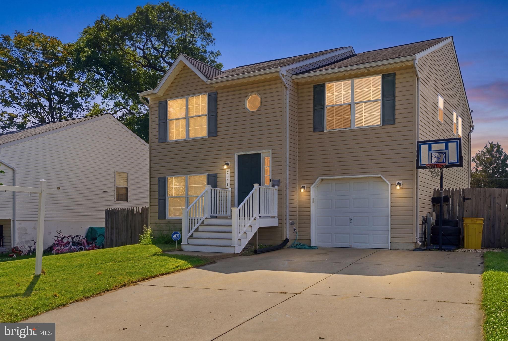 **4k Price Adjustments and new fence installed** Welcome to 761 207th St—an ideal home for anyone looking for the right mix of space, updates, and simplicity.

This 4 bed, 3 bath split foyer offers a layout that works. The main level has your living space, kitchen, and bedrooms, while the lower level gives you flexibility for a second living area, office, or guest setup—room to grow without needing to move anytime soon. 1 car garage and multiple car driveway allows for guests and personal alike. 

The kitchen was updated in 2018 with new cabinets, countertops, and stainless steel appliances, so you can move in without taking on a project. A combination of Hardwood Floors and LVP are throughout for a clean look that’s also durable and easy to maintain.

All three bathrooms have been renovated with modern ceramic tile—big updates already done.

Out back, you’ve got a deck, and firepit, perfect for entertaining or enjoying it yourself.

For someone stepping into homeownership or simply looking for a move-in ready home with flexibility, this is a straightforward option that fits both now and down the line.