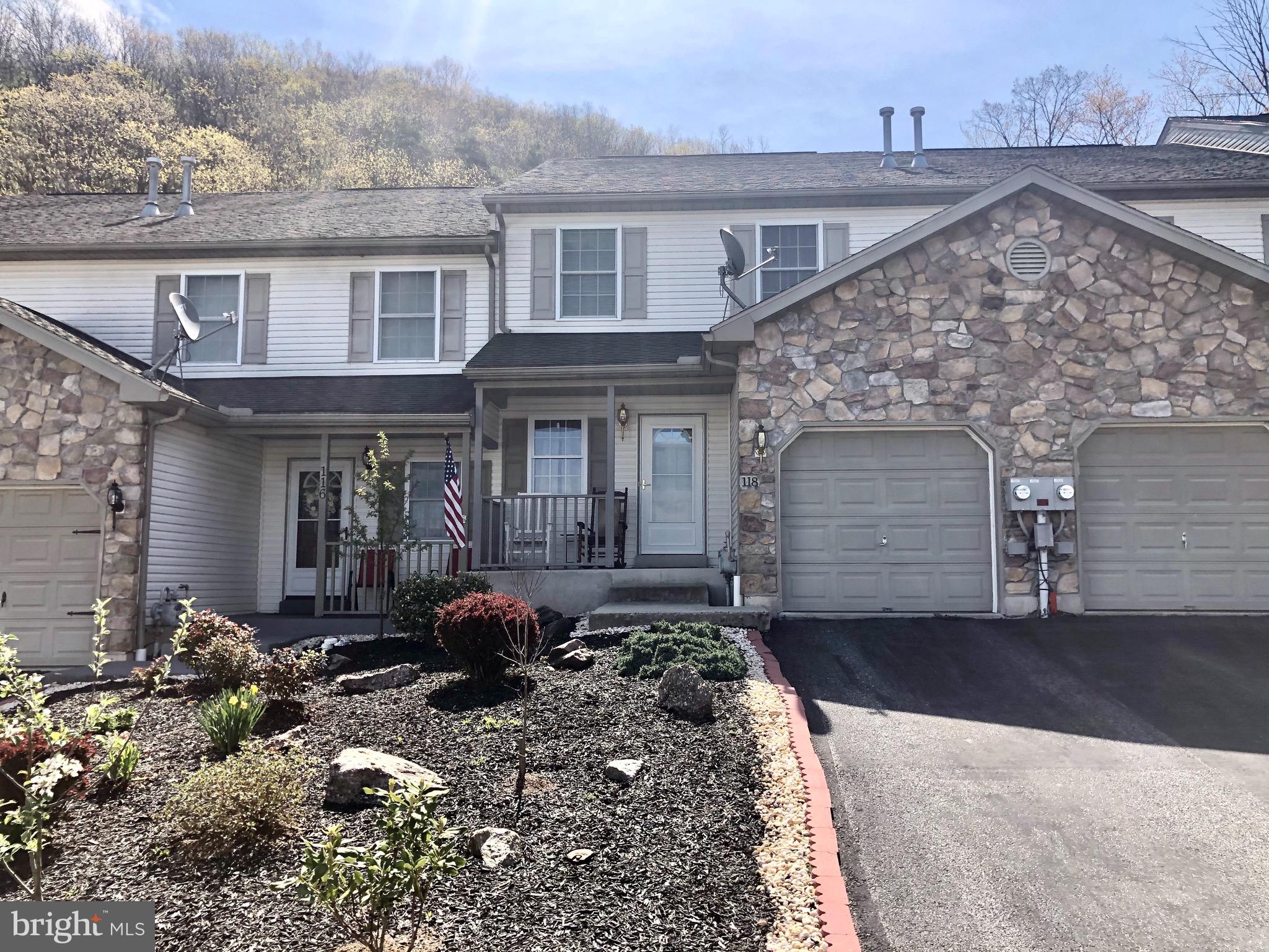 Spacious & well maintained! 3 Bedroom, 2.5 Bath townhome located in Rattling Run development. The main floor features  an open floor plan, highlighting the kitchen & center island  with plenty of cabinets & counter top for storage. Sliding doors lead to deck and the tranquility of  the back yard.  All appliances remain. Newer flooring in the living room & kitchen w/ a  corner natural gas log fireplace. A half bath & coat closet complete the main level.  Large master suite includes on suite bath with incredible closet space. Two additional bedrooms, a full bath & a convenient second floor laundry complete the upper level.  Newer hot water heater, newer appliances, heat pump, central air, economical natural gas heat. One car attached garage with opener, driveway parking.  Enjoy sitting on your deck with a great mountain view. Full basement for storage. Conveniently located on Cul de sac  with very little traffic &  on a quiet neighborhood. Easy access to Highridge  business park and  Rt 81 exit. **Due to Governor Tom Wolf's mandate regarding COVID-19, we are currently unable to allow any in-person showings of our listed properties. Contact your agent for more information**