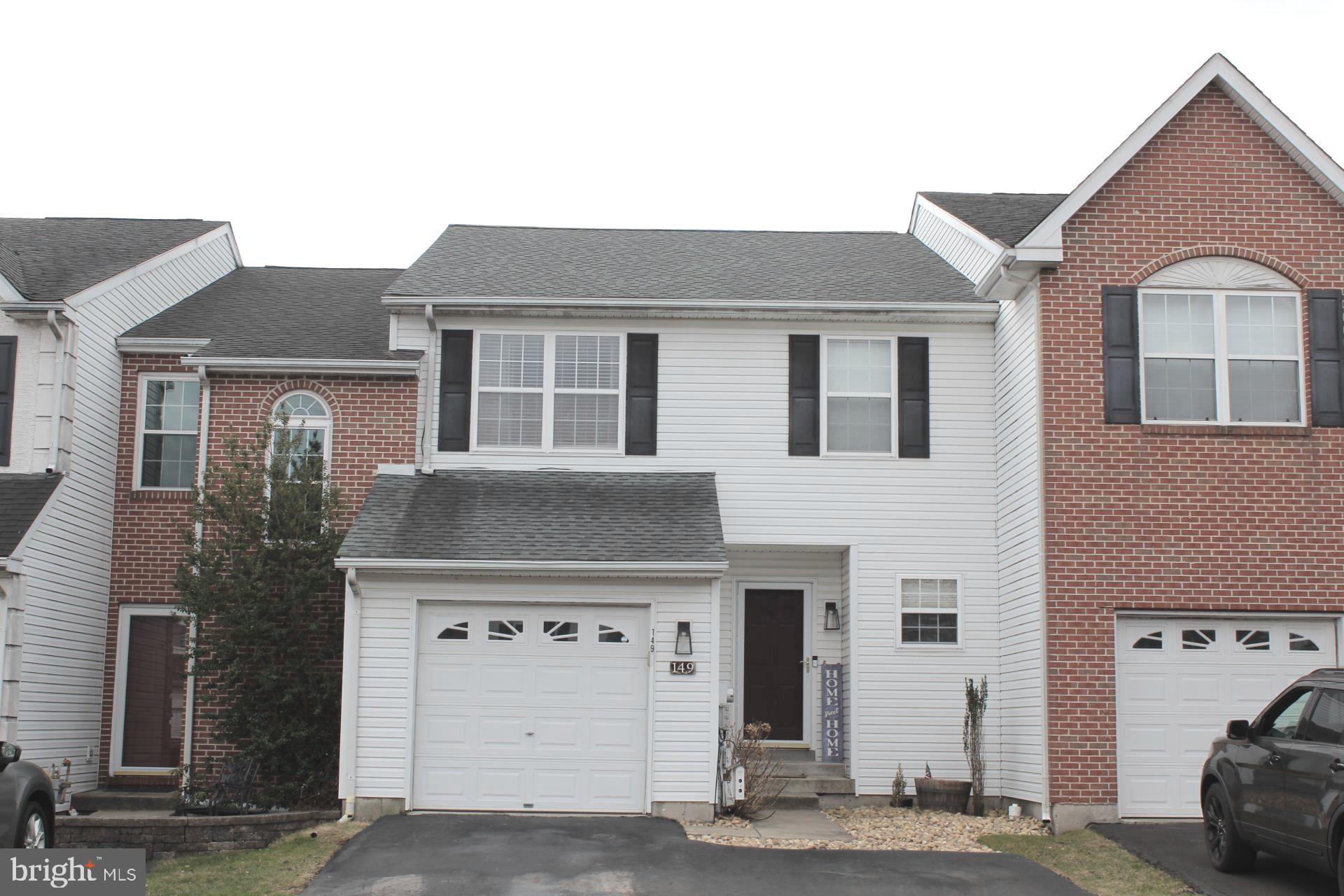 Welcome to this beautiful 3 bedroom, 2.5 bath townhome in sought after Summer Lea Community. Open floor plan w/ spacious L/R & D/R combination basked in natural light. Delightful kitchen overlooking both living and dining areas is perfect for entertaining. Slider access to the rear deck overlooking the yard. Updated power room and inside access to one car garage. Second floor master bedroom w/in suite bath and walk-in closet.  Located in the rear of home are the second- and third-bedrooms offer nicely sized closets and shared access to the hall bath w/tub/shower and vanity. Second floor laundry for convenient living.  The lower-level finished basement w/natural wood tone laminate floor provides additional living area and is currently used playroom for children.  Wonderful community w/walking trails, multiple fenced play areas for children and basketball courts. Centrally located, minutes to major arteries, schools, shopping & entertainment.