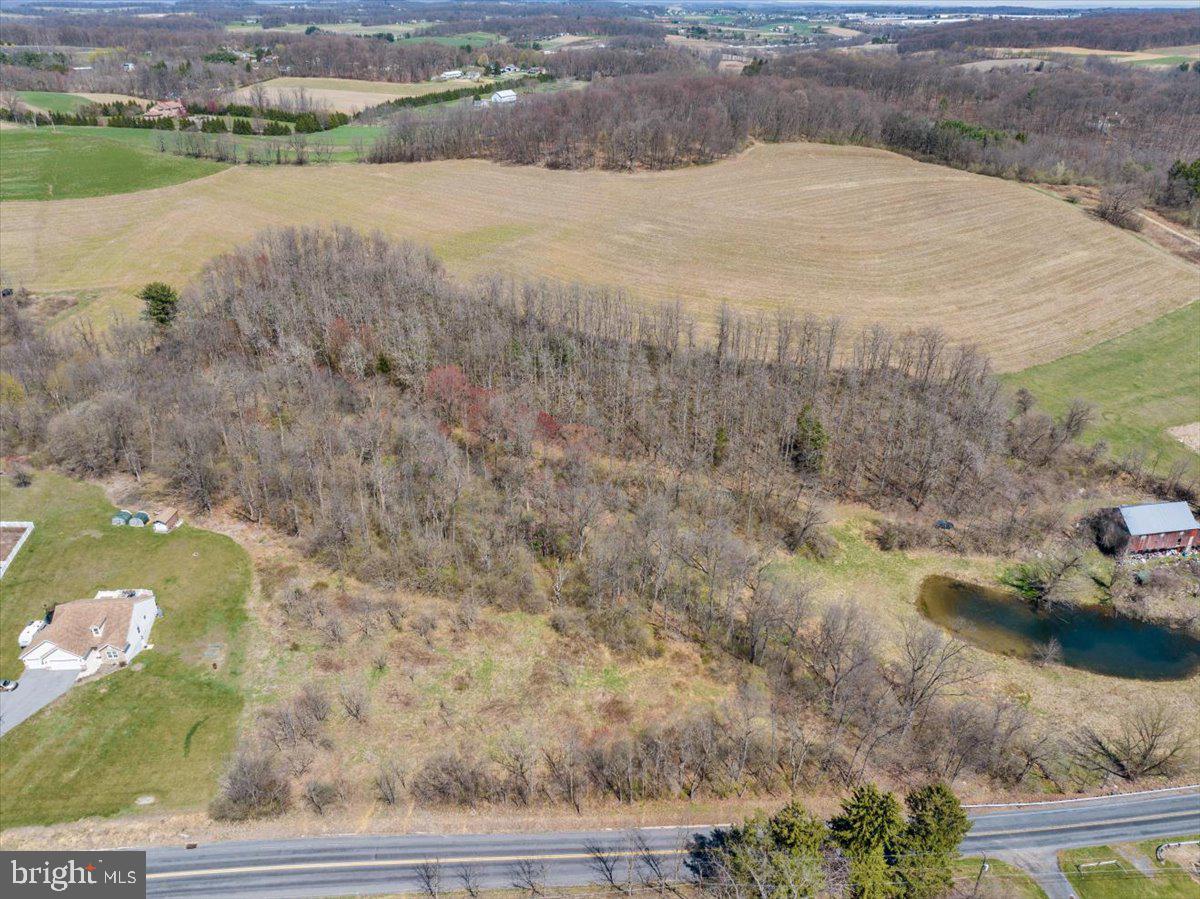 Here’s your chance to build your dream home without the wait—this 2.1-acre parcel in the Kutztown Area School District in Greenwich Township is ready to go! The sellers are relocating, creating a unique opportunity for a new owner to step in and take advantage of all the groundwork that’s been completed: perc approved for an in-ground system; septic permit obtained; driveway plans and permit completed; and stormwater engineering design and soil tests completed. All plans will be transferred to the buyer--Just bring your builder! This property offers breathtaking views of preserved farmland and overlooks a tranquil creek, providing a peaceful, scenic backdrop year-round. Enjoy the privacy and beauty of rural living while being just minutes from town conveniences and commuter routes. Don’t miss this rare opportunity!