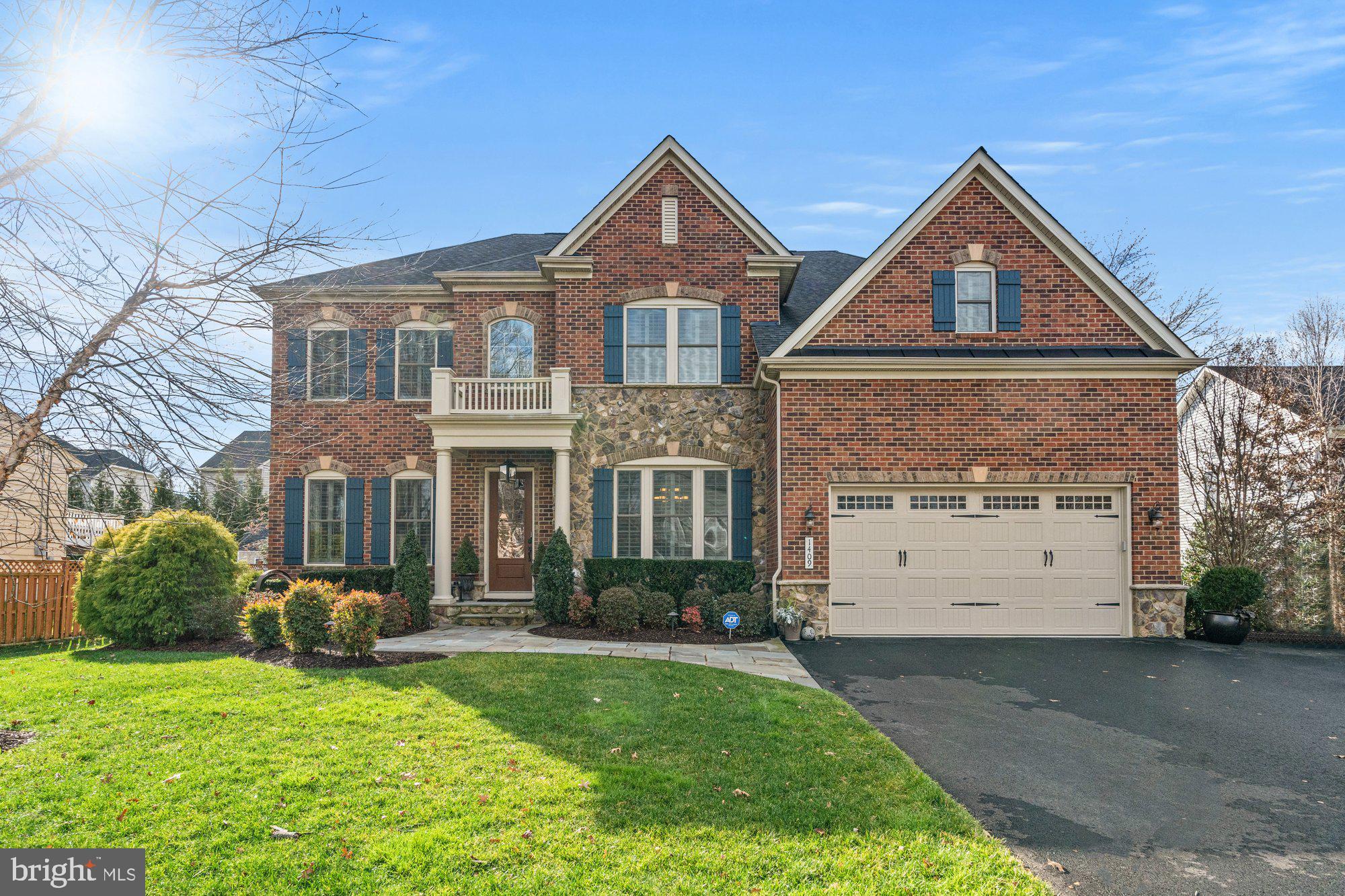 Welcome to 1409 Dade Lane .... a wonderful opportunity to own one of the gorgeous homes in Bishop's Crest. This home was the model home when Bishop's Crest was developed in 2016 and it shows!  There is custom features throughout including gorgeous flooring and lighting, oversized windows and copious amounts of stunning trim work. Natural sunlight floods the main and upper level from the grand windows. 
 The exquisite curb appeal has been maintained with precision.  There are many different varieties of trees and plants thoughtfully situated throughout the property.  Upon entering the home, you see a delightful formal living room to your left and a formal dining room to your right.  The house feels spacious and open with tall ceilings and wide-open rooms.  The kitchen wraps into a large great room with a gas fireplace.  There is nice deck off the kitchen.  An office and powder room are just beyond the great room.  There are two handsome staircases that take you to the upper level.   Upstairs you will find four bedrooms, three full bathrooms and the laundry room. The lower level has another bedroom and full bathroom, a sizable family room and a second kitchen fully stocked with all the necessary appliances and cabinet space.  The garage can be accessed off the kitchen and is great for parking cars or extra storage. The house has been maintained to a true level of perfection with incredible custom touches throughout.  A lovely and hidden enclave in the heart of 22308!  So special and truly fabulous!