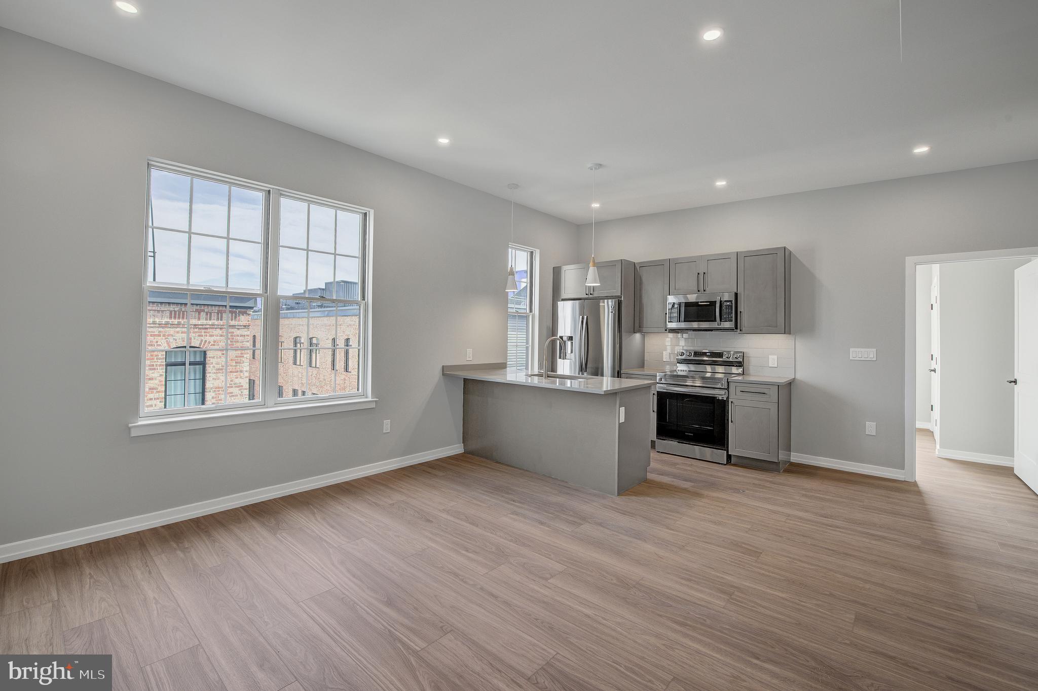 Welcome to Innovator Village, nestled in the heart of Graduate Hospital! This gated community is home to 82 brand new construction, luxury units featuring top of the line finishes. 2445 Innovator Way offers everything you could desire in a city apartment and can be moved into immediately. This unit features a spacious, open living room with huge windows and lovely natural light, a kitchen with quartz countertops and stainless steel appliances, a beautiful bathroom, hardwood floors and an in unit washer/dryer. The building features a shared roof deck with beautiful views of Center City. Innovator Village is located on the bustling Washington Ave corridor with easy access to Drexel University, CHOP, Penn University, I76, restaurants, shops, public transportation and much more! On site parking is available for lease for $300/month when available (short waitlist currently).