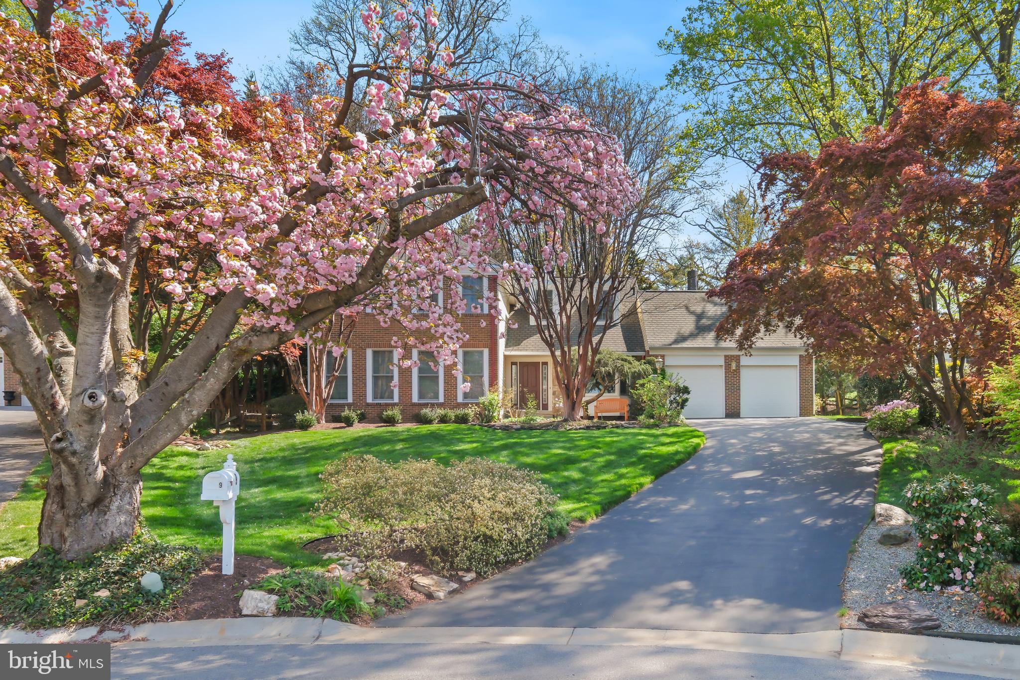 Nestled quietly at the end of a peaceful cul-de-sac in the desirable Timberlawn subdivision, this expansive residence offers the perfect blend of traditional charm and modern versatility. The main level is designed for both functionality and comfort, featuring formal living and dining rooms alongside a cozy family room. A dedicated main-level bedroom serves perfectly as a private home office, situated near the convenient main-floor laundry room. At the heart of the home, the kitchen flows seamlessly onto a massive deck, which boasts a stunning sunroom that allows you to enjoy the wooded views in any weather.

The upper level is home to four generous bedrooms, including a primary suite designed as a true sanctuary. This spacious retreat features "his and hers" closets and a spa-like ensuite bathroom complete with double sinks and a luxurious jetted tub for ultimate relaxation.

The fully finished basement adds incredible value and flexibility to the floor plan. It includes a large living area, an additional bedroom, and a full bathroom, making it an ideal setup for guests or multi-generational living. Hobbyists and organizers will especially appreciate the dedicated workshop room and the abundant storage space. With six bedrooms and three-and-a-half baths in total, this home provides an unparalleled amount of space in a prime location.