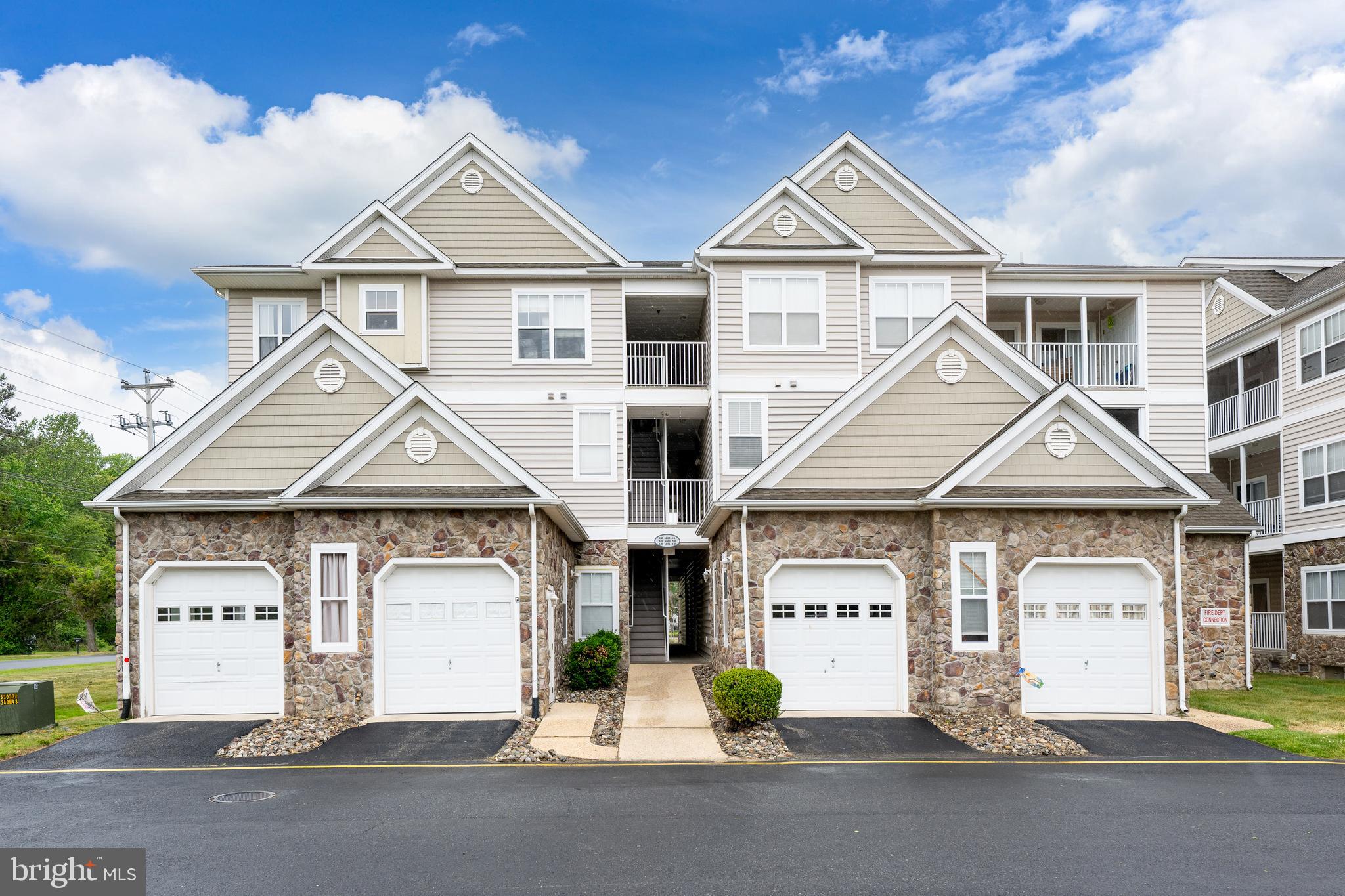 Seller is NOW OFFERING $5,000 toward CAPITAL CONTRIBUTION! Nestled in the serene Hearthstone Manor community, this charming 3-bedroom, 2-bathroom second-floor unit offers a perfect blend of comfort, convenience, and thoughtful updates. Recent improvements, including new bathroom cabinets and flooring, provide a fresh, modern feel throughout.

The inviting floor plan features a warm, open living area that flows seamlessly into the dining space, making it ideal for both daily living and entertaining. The building is equipped with an elevator, ensuring effortless access and added convenience.

Enjoy a tranquil pond view from your home, providing a peaceful backdrop for relaxation. Residents also enjoy excellent community amenities, including an outdoor pool, a clubhouse, and beautifully maintained grounds. With lawn care included, you can enjoy a low-maintenance lifestyle in a truly delightful setting.
