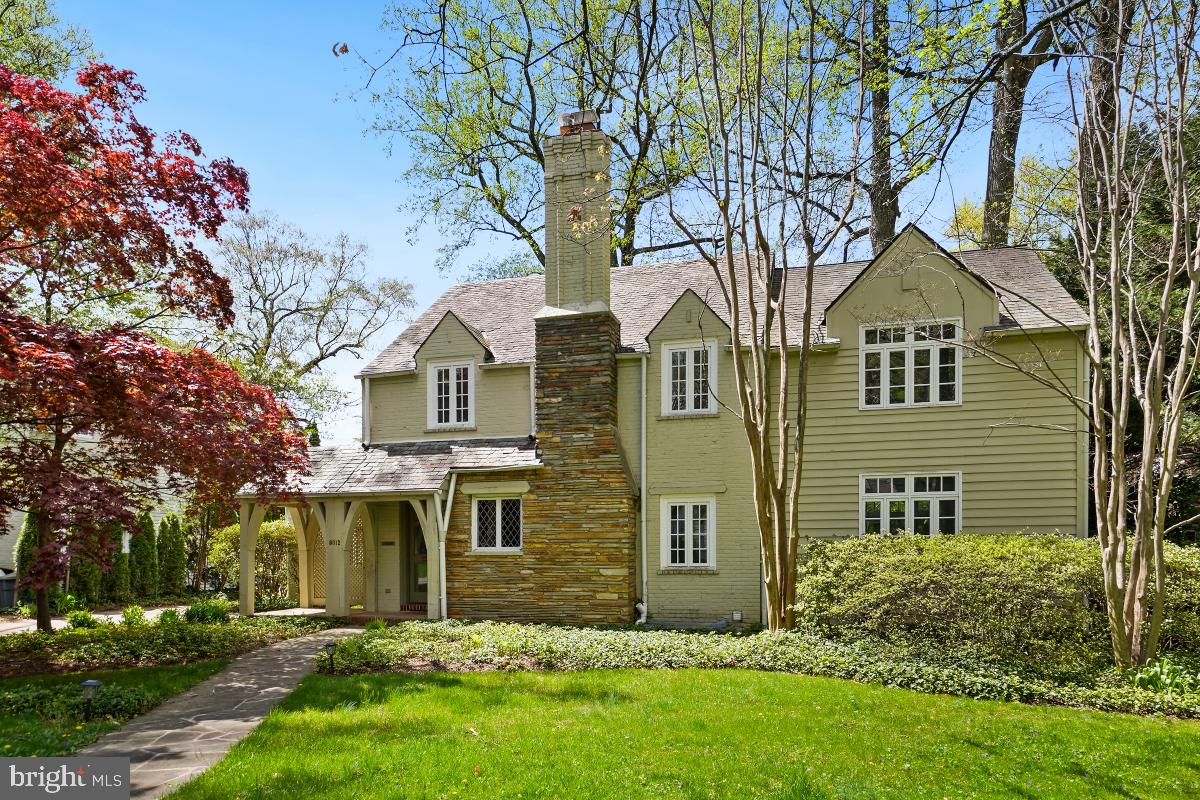 Price Improved...Welcome to 8012 Hampden Lane.  This picturesque Tudor style home in Greenwich Forest has 4 bedrooms and 3.5 baths. Upon entering on the main level, you  will notice the abundance of natural light and beautiful hardwood flooring. This level includes an office, a living room, a dining room, a kitchen that opens to a family room and a powder room. Upstairs, the owner's suite has a large walk-in closet, an en-suite bath with dual vanities and a steam shower. There are 3 additional bedrooms as well as a hall bath on this level. The lower level has a large recreation space as well as a full bath and laundry. The backyard is the ultimate at-home oasis with a back deck and beautiful landscaping. Located in the Walt Whitman school cluster and just minutes from downtown Bethesda makes this house your perfect home!