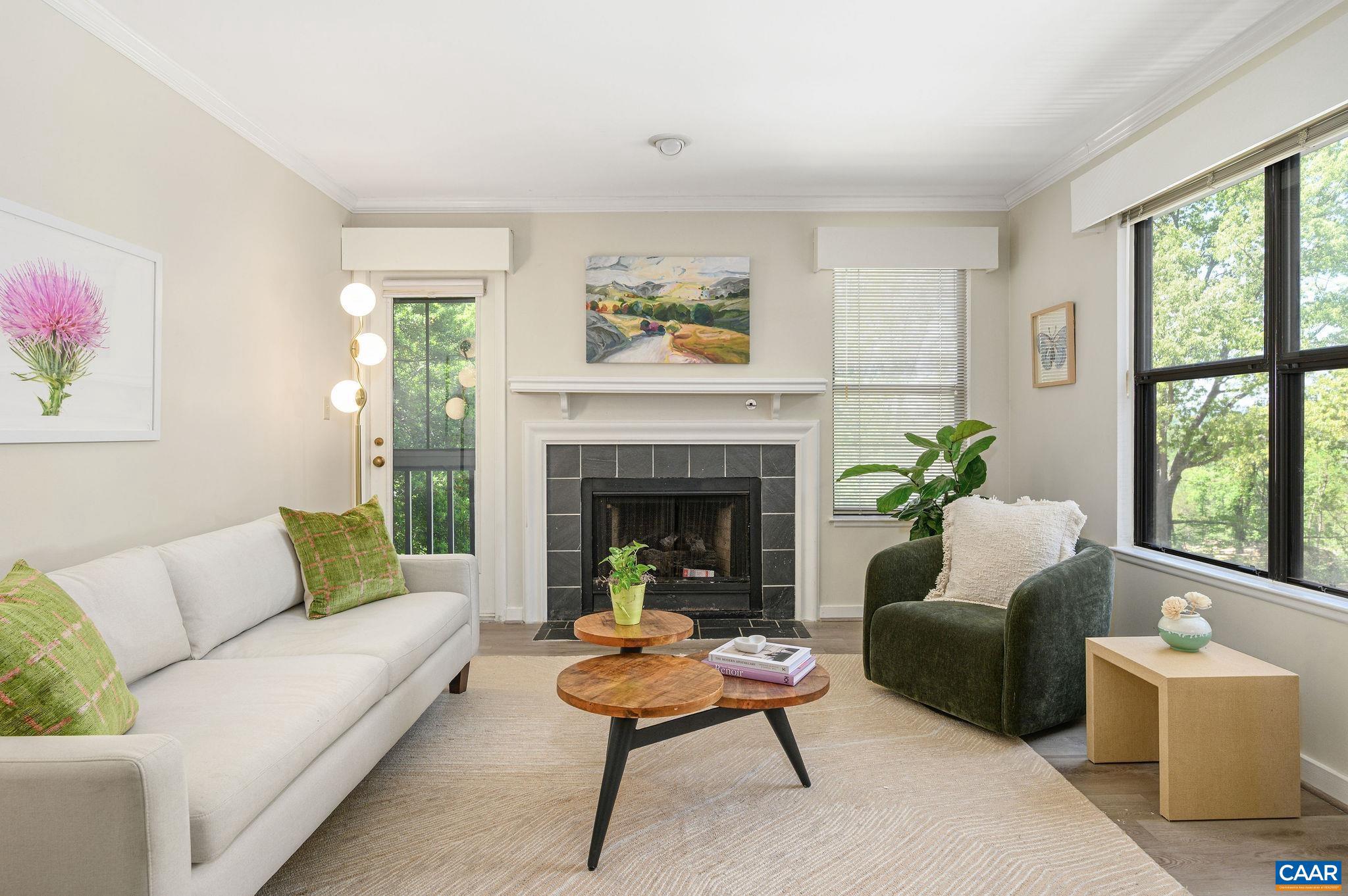 Top-floor condo offering easy, maintenance-free living. The bright living room opens seamlessly to the kitchen and dining area, creating an inviting and functional layout. The home features two bedrooms and two full baths, along with a screened porch?perfect for relaxing or enjoying morning coffee. Ideally located close to Historic Downtown, Sentara Martha Jefferson Hospital, I-64, and a wide range of shopping and dining options. Community amenities include a pool, adding to the ease and enjoyment of condo living.,White Cabinets,Fireplace in Living Room