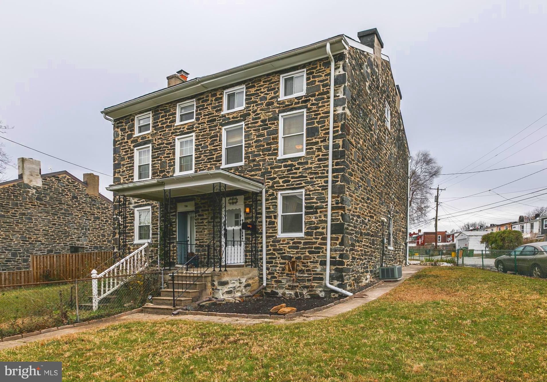 Handsomely updated throught, this absolutely charming,  3BR, 2 Full Bath  Stone Hill home offers generous room sizes, original hardwood floors, two impressive fireplace mantles (decorative- marble & granite), recently updated Kitchen & Baths PLUS a private parking pad! Situated on a corner lot, this sought-after granite block home overlooks the historic Steiff Silver building and is an easy jaunt to all the action of Hampden, Remington, Charles Village & JHU Campus. On/Off to I-83 couldn't be easier.  Make this beauty your own!Link to info about Stone Hill Historic District:  http://www.livingplaces.com/MD/Independent_Cities/City_of_Baltimore/Stone_Hill_Historic_District.html