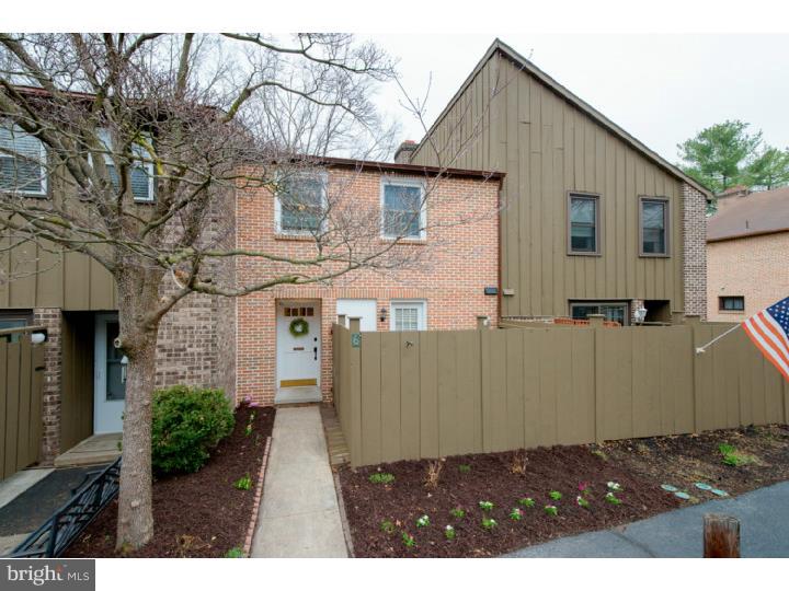 Beautifully updated townhome in Flying Hills, tastefully decorated in a neutral palette with hardwood floors throughout.  You will appreciate the open floor plan in the kitchen and dining area.  The kitchen has been remodeled with the addition of a breakfast bar, new hardwood floors, updated cabinetry and hardware, new countertops and tiled backsplash.  The stairs have also been given a modern updated look with new risers and railings. The spacious living room is bright and sunny with tall windows, a working fireplace, and walkout access to the deck. Upstairs there are 2 spacious bedrooms on the 4th level, along with a full bathroom with new tub and tile flooring.  The master suite is on the 3rd level complete with its own bathroom with shower stall and tile flooring, vaulted ceilings, and walk-in closet.  The family room in the finished basement is comfortable and stylish with built-in bookshelves and recessed lighting, and it is also wired for surround sound.  Other noteable percs include plenty of storage, central air, gas heat, new ceiling fans, newer replacement windows, and a new HVAC system.  So schedule your showing today.  This is your chance to own a fantastic home in a great location.