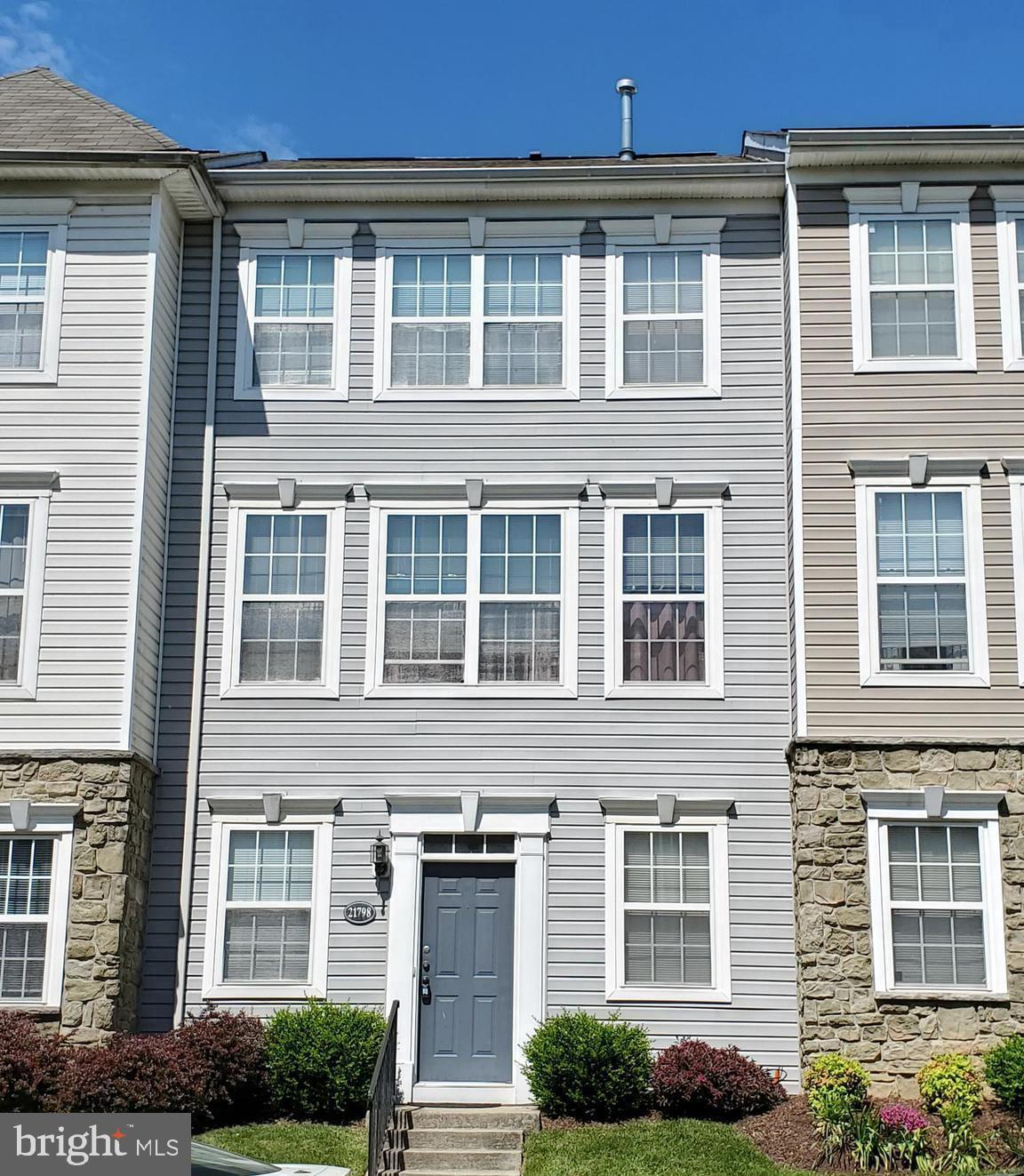 Welcome to this well-maintained 3-level townhome in the highly sought-after Parkside at Ashburn, a gated community in Loudoun County. This spacious 2-bedroom, 2-full-bath home features a 2-car garage, neo-traditional architecture, and offers a smart, flexible layout ready for your personal touch. The freshly painted main living level boasts a large, inviting family room with a cozy fireplace, a bright dining area, and an open-concept kitchen with center island perfect for daily living and entertaining.  Step out from the kitchen to your private deck, ideal for relaxing or entertaining. The lower-level entry offers a bonus space, perfect for a home office, study or recreation room. While the home has not been recently updated, it presents an exciting opportunity for customization to fit your taste and lifestyle. Residents enjoy resort-style amenities: Gated access, Lawn Care Maintenance Included, Clubhouse and party room, Outdoor swimming pool, 24-hour fitness center, Basketball court, Patio with barbecue grill, and Tot lots and walking trails. Ideally positioned off Waxpool Road, between Broadlands and Ashburn Village, with easy access to the Silver Line Metro, Dulles Greenway, Routes 7 and 28, and Dulles Airport. Just minutes from shopping, dining, grocery stores, and entertainment at One Loudoun and other nearby centers. Don’t miss this chance to own in one of Ashburn’s most convenient and amenity-rich communities—ready for your vision and upgrades!