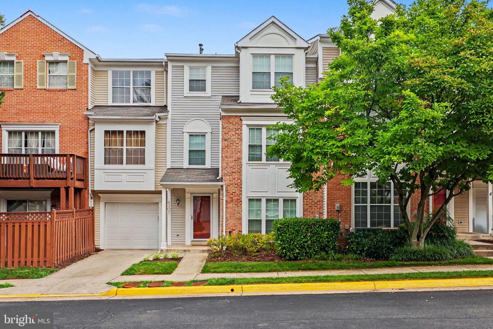 Beautifully updated 3-level townhouse-style condo in a prime Fairfax location, close to Wegmans and Fairfax Corner. Open-concept floor plan, hardwood floors, updated systems, and a luxurious primary suite combine with outstanding community amenities and commuter convenience. The main level features a spacious living and dining area with hardwood floors, recessed lighting, gas fireplace, custom blinds, walk-in pantry, and an updated kitchen with white cabinetry, quartz countertops, subway tile backsplash, stainless sink, and breakfast bar.  The second level offers two freshly painted bedrooms with hardwood floors, custom window treatments, closet organizers, a full hall bath, and laundry room with 2022 LG front-load washer and dryer. The entire upper level serves as a private primary retreat boasting a vaulted ceiling, sitting area, walk-in closet, and a fully renovated spa bath completed with high end finishes in 2022. Enjoy a freestanding soaking tub, oversized walk-in shower with herringbone tile, Carrera marble double vanity, designer lighting, and vaulted ceiling. Additional updates include the roof, windows, furnace, and water heater (2020) and AC (2024). The attached garage offers an extensive storage system with cabinets, shelving, and hooks that convey, plus additional driveway parking. Residents enjoy a community pool, tennis courts, tot lots, and walking trails. Minutes to shopping, dining, entertainment, and I-66. Condo association plans to replace exterior siding in the coming years.