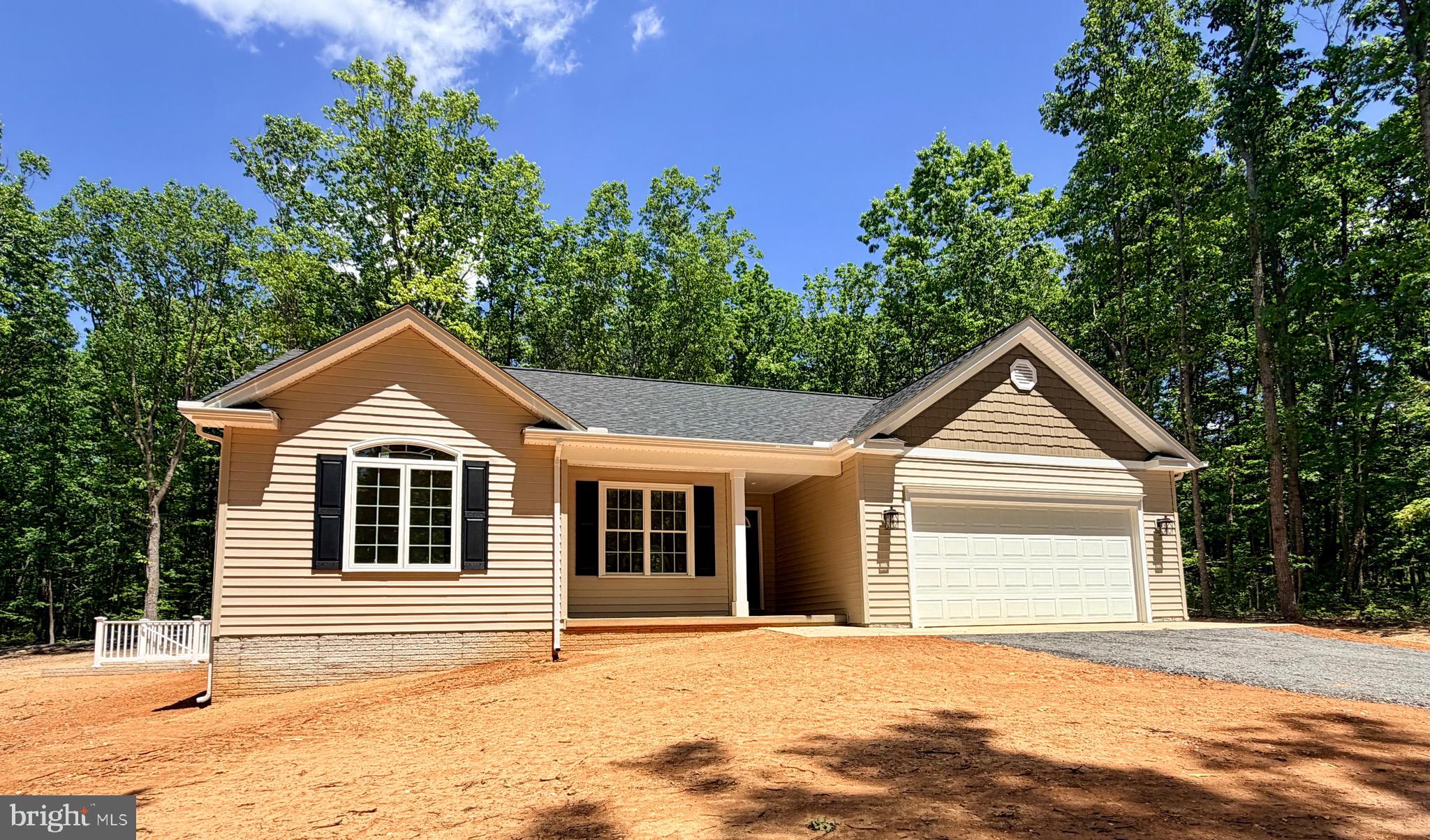 UNDER CONSTRUCTION! CHARLESTON II MODEL - LOT 10- Located on a lovely 2.101 acre mostly wooded lot. Home will include an open floor plan with Stainless Steel Appliances and Granite Counter Tops in kitchen, Cultured marble vanity tops in the bathrooms, Covered front porch, Unfinished Basement with bathroom rough-in for future expansion and a 2 car garage. Still time to make your selections! Call for more information or to schedule a showing! Road Maintenance Agreement. **Listing photos are similarity photos.** FYBERLYNC Available! Please call Fiberlync for more information and confirmation.