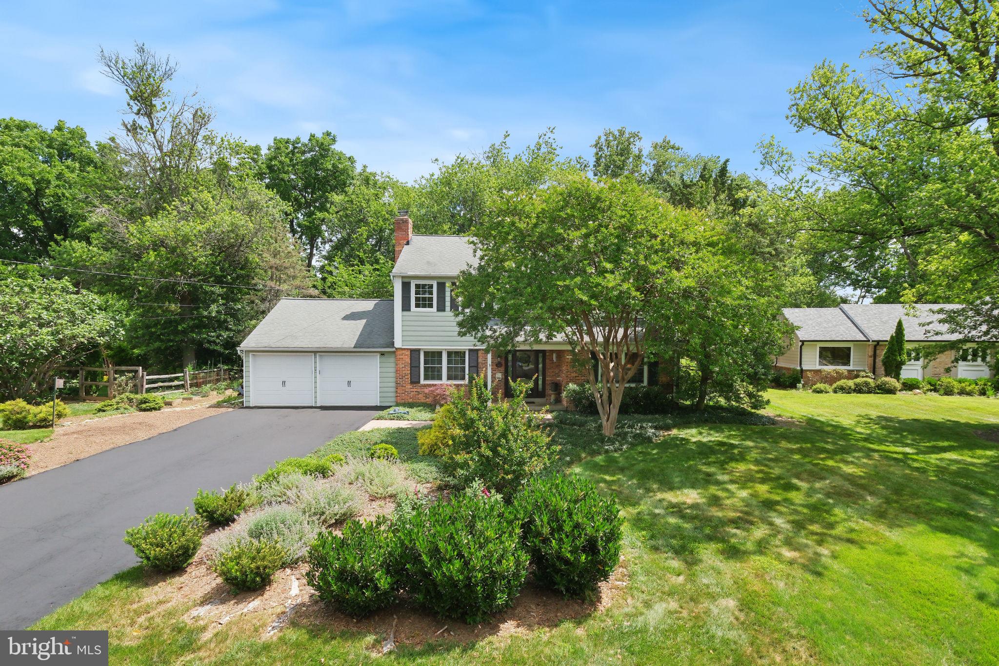 Discover 38 Orchard Way N, sited on a quiet street in the established Falls Orchard community, one of Potomac's most sought-after neighborhoods. The home offers five bedrooms, two full bathrooms, two powder rooms, three finished levels, and 3,456 total square feet. Meticulously maintained and thoughtfully updated, the home includes a new hot water heater (April 2026), new HVAC (2025), all exterior doors and the garage door replaced (2024), a kitchen remodel, updated bathrooms, a basement renovation, driveway resealed (June 2026), exterior painted (2022), a reimagined back patio and front walk, all original windows replaced with Pella double-pane windows, roof replaced (2004 with a 30-year warranty), fresh paint throughout most of the home, and more. One of the many highlights of this home is the 0.47-acre lot, allowing for a private, fully fenced backyard retreat. Boasting a large paver patio, expansive level green space, and an 8x8 storage shed, it creates an ideal setting for outdoor dining, recreation, gardening, or simply relaxing. Professional landscaping and a brick walkway welcome you to this traditional center hall Colonial defined by elegant details, including spacious rooms, white oak hardwood floors throughout the main and upper levels, crown molding, wainscoting, and abundant windows that fill the home with natural light. The renovated kitchen sits at the heart of the home. It is appointed with Silestone countertops, custom cherry cabinetry and a matching hood, recessed lighting, a breakfast bar peninsula, a travertine backsplash, a garden window, and a built-in workstation. Just off the kitchen, the family room features built-in cabinetry and an entertainment center, a brick accent wall with a wood-burning fireplace, and access to a mudroom/laundry room that exits to the oversized attached two-car garage. On the opposite side of the kitchen, the formal dining room offers floor-to-ceiling windows and a glass door opening to the patio and backyard. A formal living room, powder room, and coat closet complete the main level. The upper level offers five bedrooms, a rare find in this neighborhood, all with hardwood floors and ceiling fans. The primary suite includes double closets and an attached bathroom. The en-suite features a standalone shower, ceramic tile finishes, and can function as a Jack-and-Jill bath depending on owner preference. Four additional bedrooms, a hall bathroom with a tub-shower combination, and a large linen closet complete this level. The fully finished lower level was renovated by the current owners with resilient luxury vinyl plank flooring, recessed lighting, a rec room, powder room, closet storage, and a large utility room with additional storage space. The flexible area is perfect for use as a media room, home gym, office, guest suite, or more. Ideally located with easy access to shopping, dining, entertainment, and major commuter routes. Close to parks, recreation, and nationally rated golf courses. Served by top-rated Montgomery County schools. Don't miss this rare opportunity to own in one of the DC area's most desirable communities!