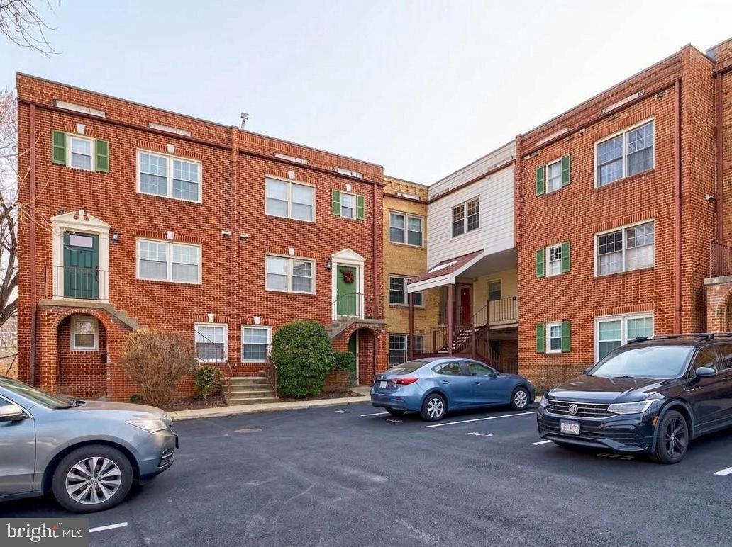 New Price & freshly painted in May! Spacious 2-bedroom, 2.5-bathroom garden condominium, set in a charming brick building, offering a blend of condo convenience while living like a townhome on two levels with a private backyard patio. Spanning approximately 1,132 square feet, the open floor plan features a large family room with wood-burning fireplace and a formal dining area. The eat-in Kitchen features stainless steel appliances and a pass through with bar seating. A powder room and private fenced patio complete the main level. Upstairs features two large bedrooms including a generous Owner’s Suite set privately away from the main living area. Enjoy in-unit laundry, assigned parking with low condo fee. Easy access to parks, and Arlington’s best restaurants, shopping and entertainment. Schedule your tour today!
