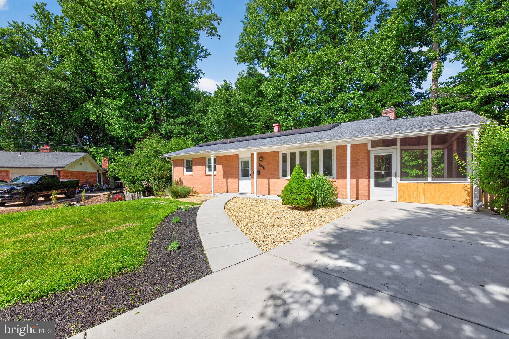 Phil Sturm of Long and Foster Real Estate presents this bright, spacious four-bedroom, three full bath Contemporary located in the desirable Foxhall Subdivision of Silver Spring, MD. This comfortable oasis of tranquility is situated on a .4290-acre lot on a quiet cul de sac.  Relax on your new patio overlooking a peaceful wooded lot.  Quiet cul-de-sac backing to trees & open space; 4 BR, 3  Full BA; spacious and comfortable open living and dining rooms; country, eat-in kitchen with bay window; very large lower level family room with fireplace; minutes to METRO, Brookside Gardens, neighborhood parks & community shopping.  A walkway bordered by a grass yard welcomes you to this classic Mid Century Modern home. The entry foyer has a coat closet and leads to the spacious living room/dining room, the kitchen to the right and the hallway to the bedroom wing to the left. The Combination living room/dining room has a wall of picture windows and recessed lighting bathing the interior with light.  The dining area has room for a large dining room table.  Bay windows bring light into the well designed table spaced kitchen featuring new appliances and ample cabinetry.  The kitchen boasts upgraded countertops, tile flooring, a door accesses a spacious screened porch and patio perfect for Al Fresco dining. The large primary bedroom has two exposures, double closets and room for a King sized bed.  The primary bathroom has been renovated. The hall features a linen closet and a renovated full bath. There are two additional bedrooms on the main floor with double closets and large windows. The lower level has a large open family/recreation room with a fireplace, and a walkout level sliding glass door to a patio.  The spacious paving stone patio overlooks a forest, a perfect setting for relaxation and entertaining. The lower level also has a fourth bedroom, a multi-purpose room perfect for an office or exercise room, a utility room, a laundry/storage room and a full renovated bath. Terrific location – convenient to shopping, dining, the walking trails of Matthew Henson Park and the Glenmont Metro station.