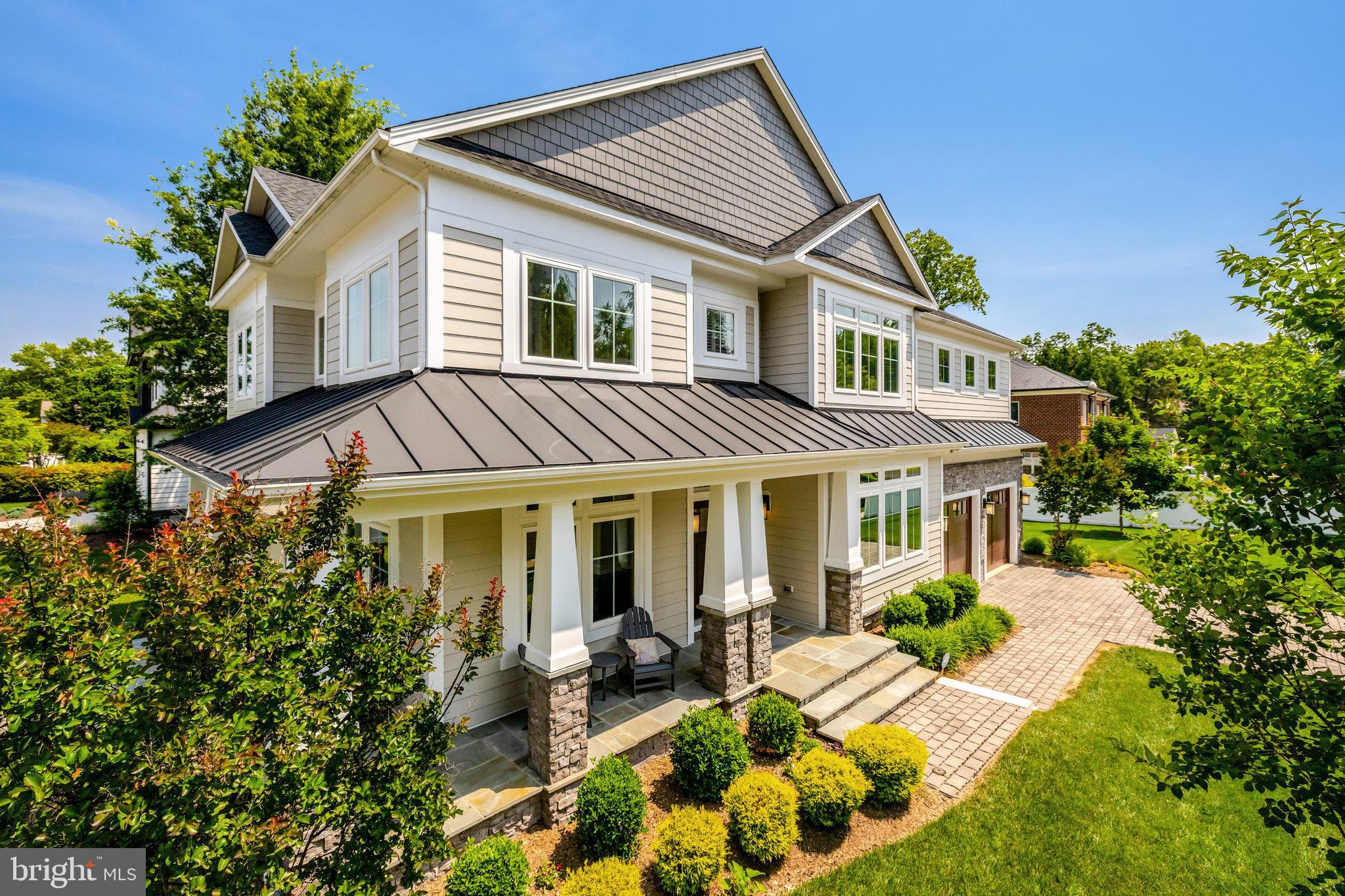 A stunning custom-built home tucked away on a quiet cul-de-sac in the heart of Vienna. Just a short stroll to Church Street, Whole Foods, W&OD Trail, Vienna Community Center, and top-rated schools—Louise Archer Elementary (Magnet), Madison High, and Thoreau Middle.

This beautifully crafted residence features a charming wraparound porch, Hardiplank & stone exterior, and a flat, private backyard perfect for entertaining. Inside, enjoy rich hardwood floors, coffered ceilings, and a chef’s kitchen with JennAir appliances, Monogram wall oven, and a commercial-grade exhaust system.

The luxurious primary suite is a retreat of its own—offering heated floors, a tray ceiling, a private office with cathedral ceiling, double-sided fireplace, two spacious walk-in closets, and abundant natural light.

Additional highlights include:
• Two-zone Carrier HVAC systems
• Upstairs laundry room
• Oversized two-car garage
• Walkable to Louise Archer & Madison High—just a few steps away

A rare opportunity to own a truly exceptional home where luxury meets lifestyle in the most sought-after part of Vienna.