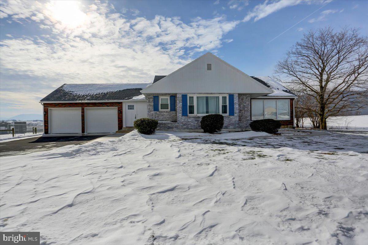 **OPEN HOUSE HAS BEEN CANCELED. Sorry for the inconvenience.** 
This solid-built brick home boasts four bedrooms and two bathrooms. Situated on just over a half acre(+/-) this property features a fenced-in backyard, deck, and ample parking in the paved driveway. Interior highlights include a mudroom, an eat-in breakfast nook, a formal dining room, hardwood floors, a spacious living room, fireplace, and large bay windows. Three bedrooms and a full bathroom are located on the main level while the upstairs attic has been converted into a large spacious room with an attached full bath.