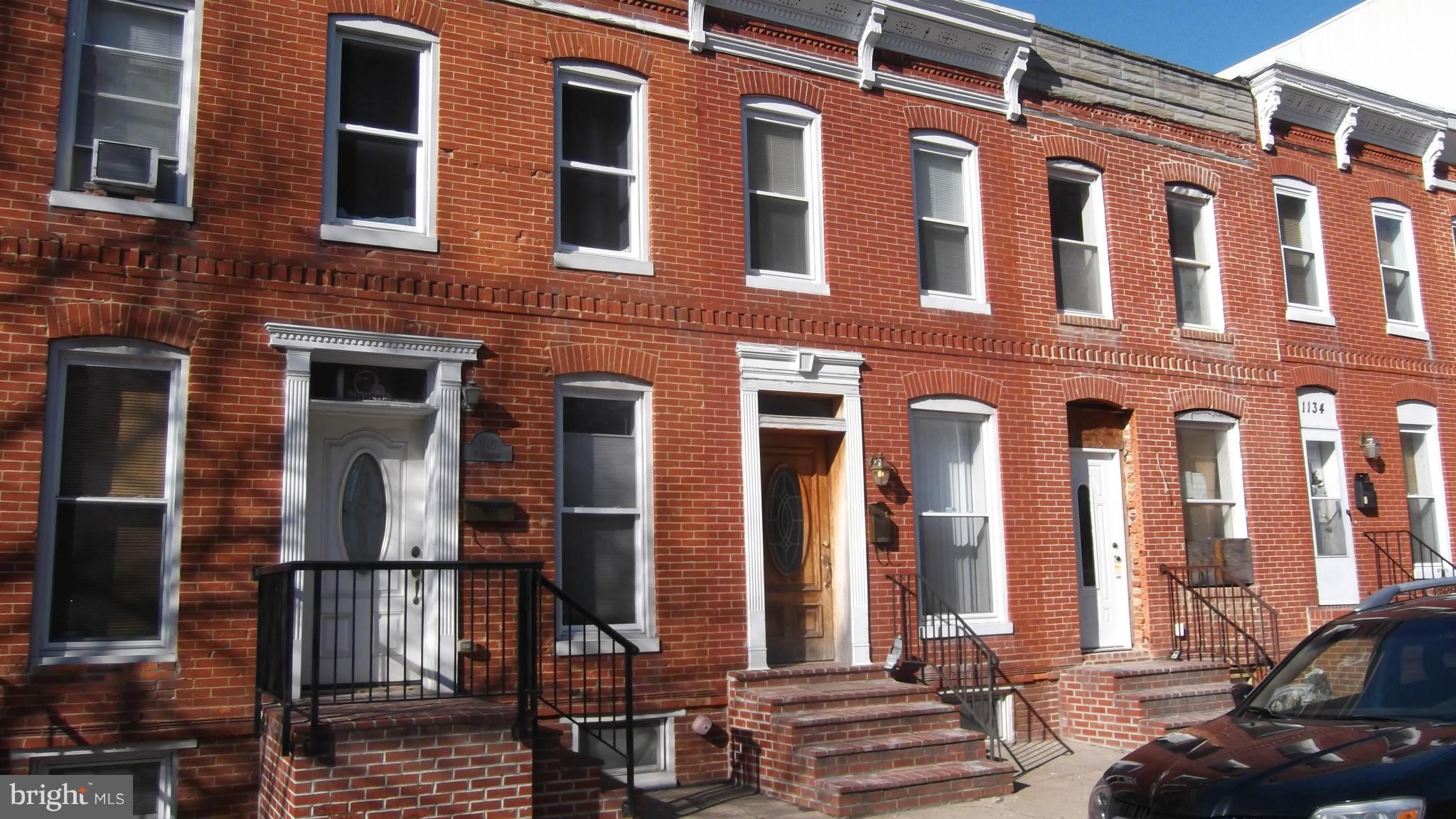 Fantastic Washington Village home w/ granite counters, stainless steel appliance, exposed brick, hardwood floors, jetted tub and PARKING!! Room for 3 cars!  Finished lower level, room for storage,  Move-in ready!!!  Close to Stadiums and major commuter routes, See it today!!