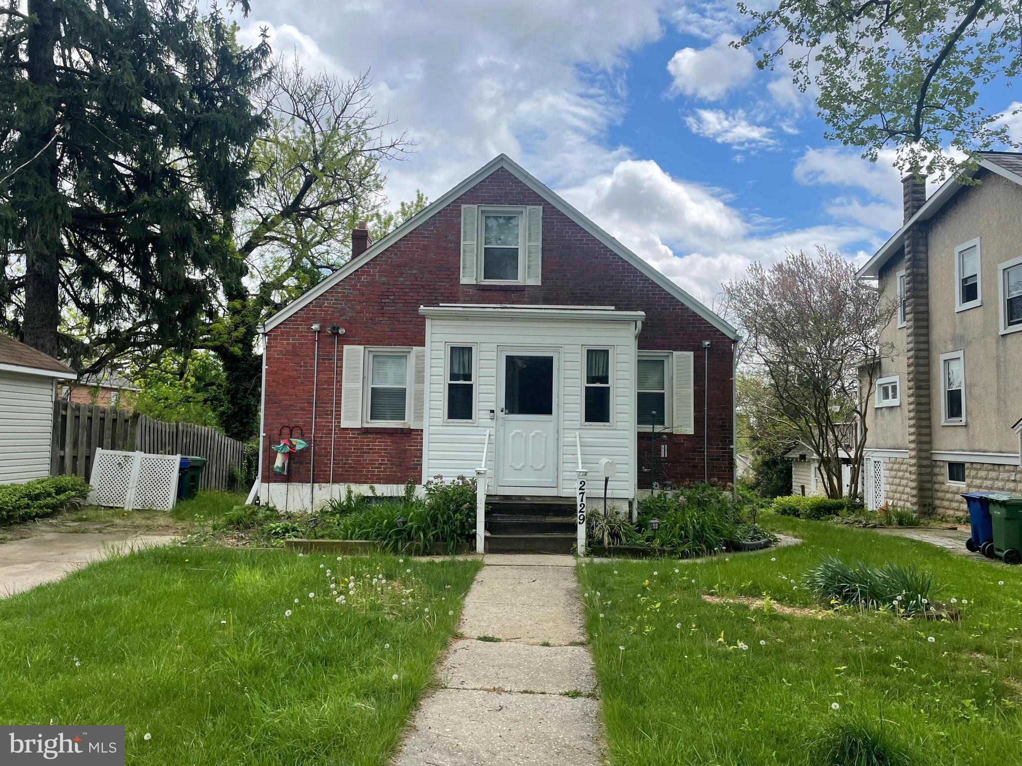 Investor Opportunity.  House has good bones.  Full basement w/ windows & 7 ft+ ceilings & walkout. 
 Updated water supply lines.  Sewer line replaced in 2022.  Updated electric 200amp.  Hardwoods under the carpet on the main level.  Cape Cod.  Big fenced yard.  Large upper level-plenty of head room.  Large finished basement.  Off street parking.  Tons of potential here!