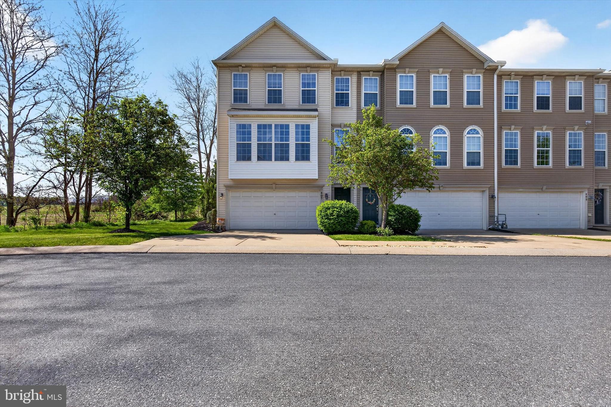 Welcome home to Brookmeadow in Mechanicsburg! Located in the award-winning Cumberland Valley School District, this spacious end-unit townhome-style condo offers over 2,500 sq. ft. with 3 bedrooms, 2.5 baths, 9-foot ceilings, and an open, airy layout.

Enjoy thoughtful updates including a two-zone HVAC system, new water heater, fresh main-level carpet, newer roof, elegant hardwood flooring, and generous living spaces throughout. The oversized primary suite features a tray ceiling, walk-in closet, soaking tub, and double vanity. Additional highlights include a dedicated office/den, upper-level laundry, ample pantry space, balconies, and a large private deck.

The heated walkout basement offers excellent potential for additional living space, a bedroom, gym, or recreation room. An attached 2-car garage provides convenience and extra storage.

As an end unit, this home offers added privacy and outdoor space, while the Brookmeadow community features green spaces, a cozy fire ring, seasonal events, and a welcoming neighborhood feel. HOA services include exterior maintenance, landscaping, lawn care, and snow removal.

Conveniently located near Carlisle Pike, Wegmans, Target, Walmart, shopping, dining, and commuter routes, this home offers the perfect blend of space, updates, convenience, and community charm.